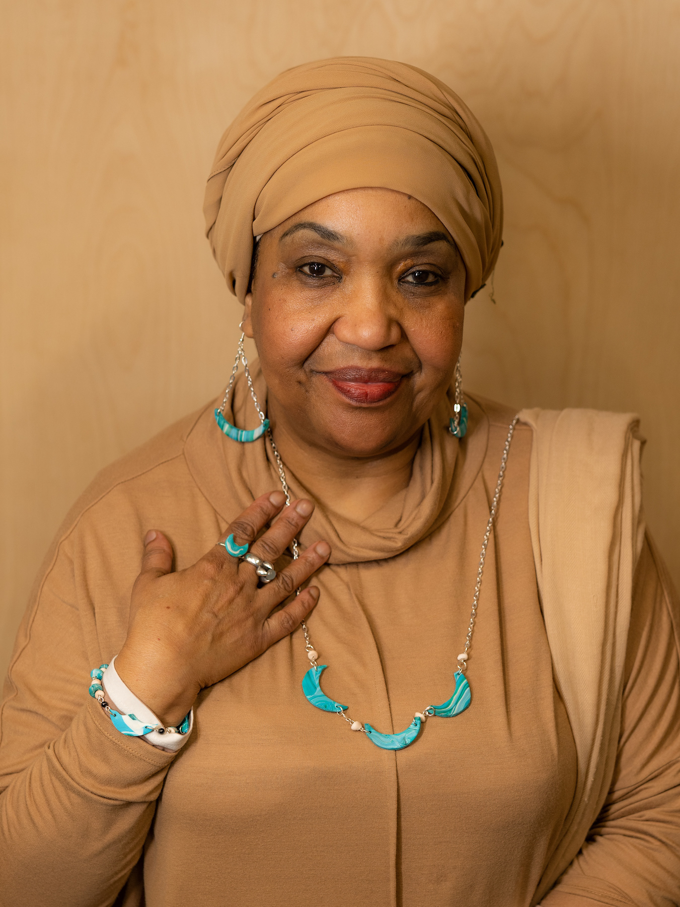 Portraits following a craft workshop with newly-made jewellery