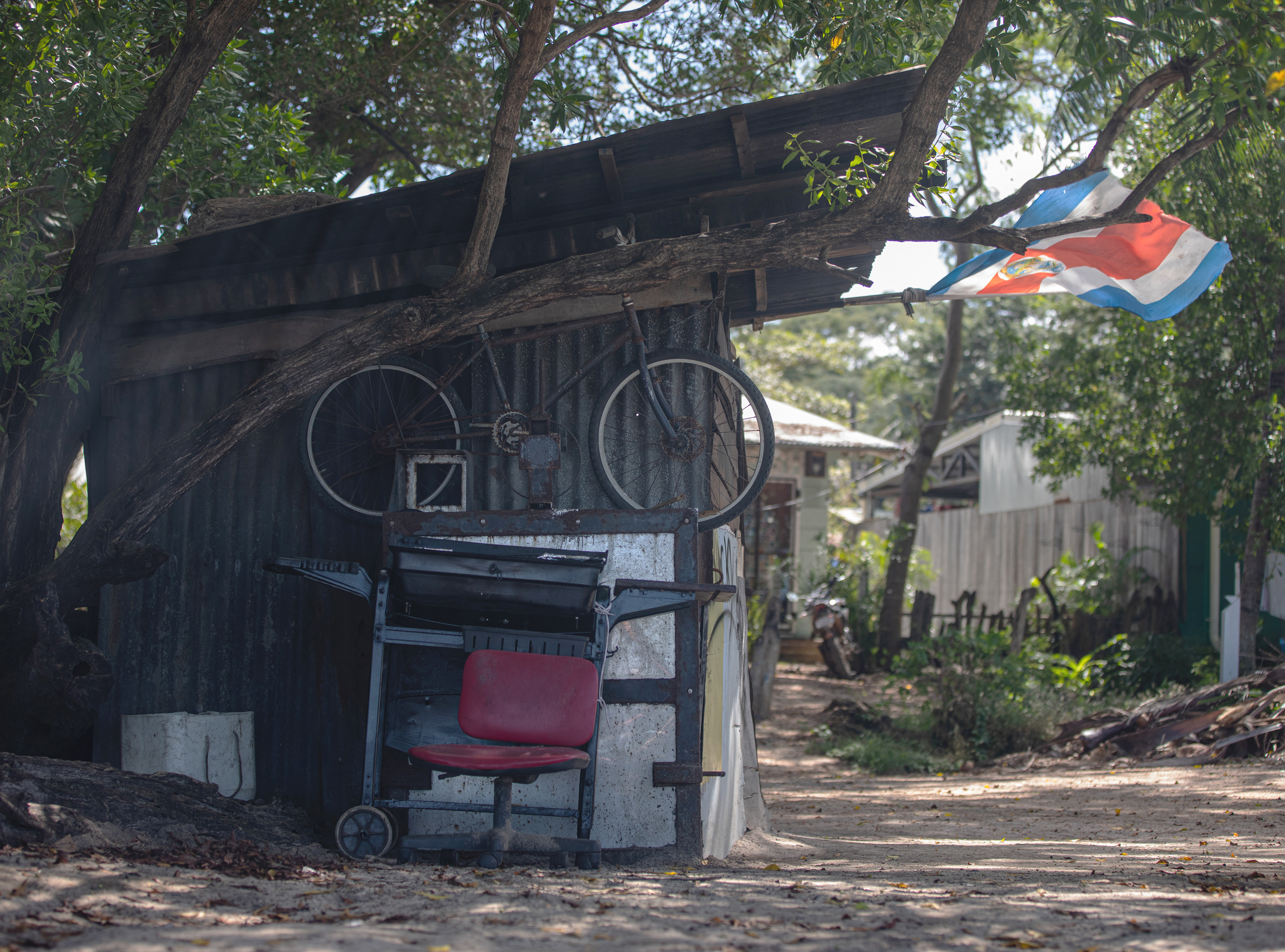 Even shed surrounded by smoke from locals burning down stuff deserves to carry national flag.