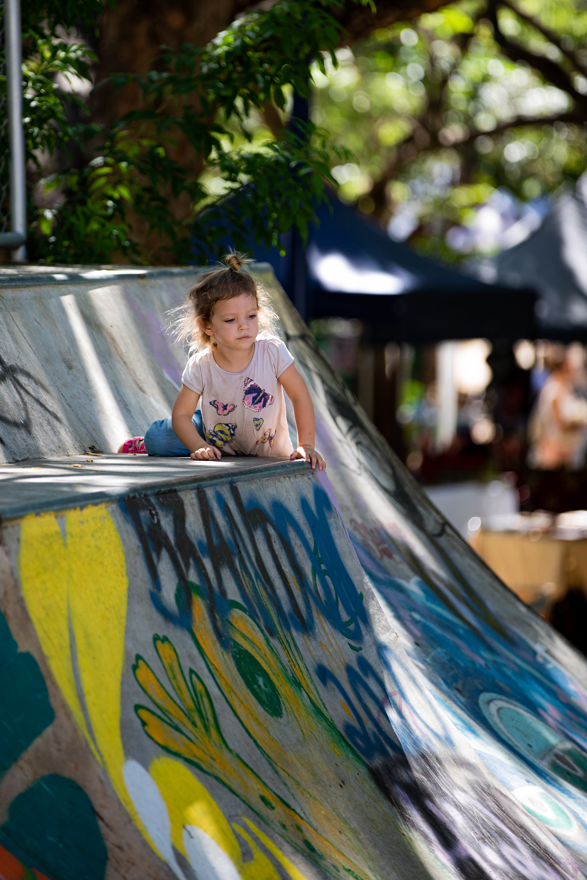 Her older friends were skateboarding there. She wanted to be right in the action.