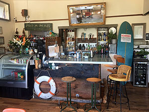 Cozy bar area with 6 taps for beer or kombucha