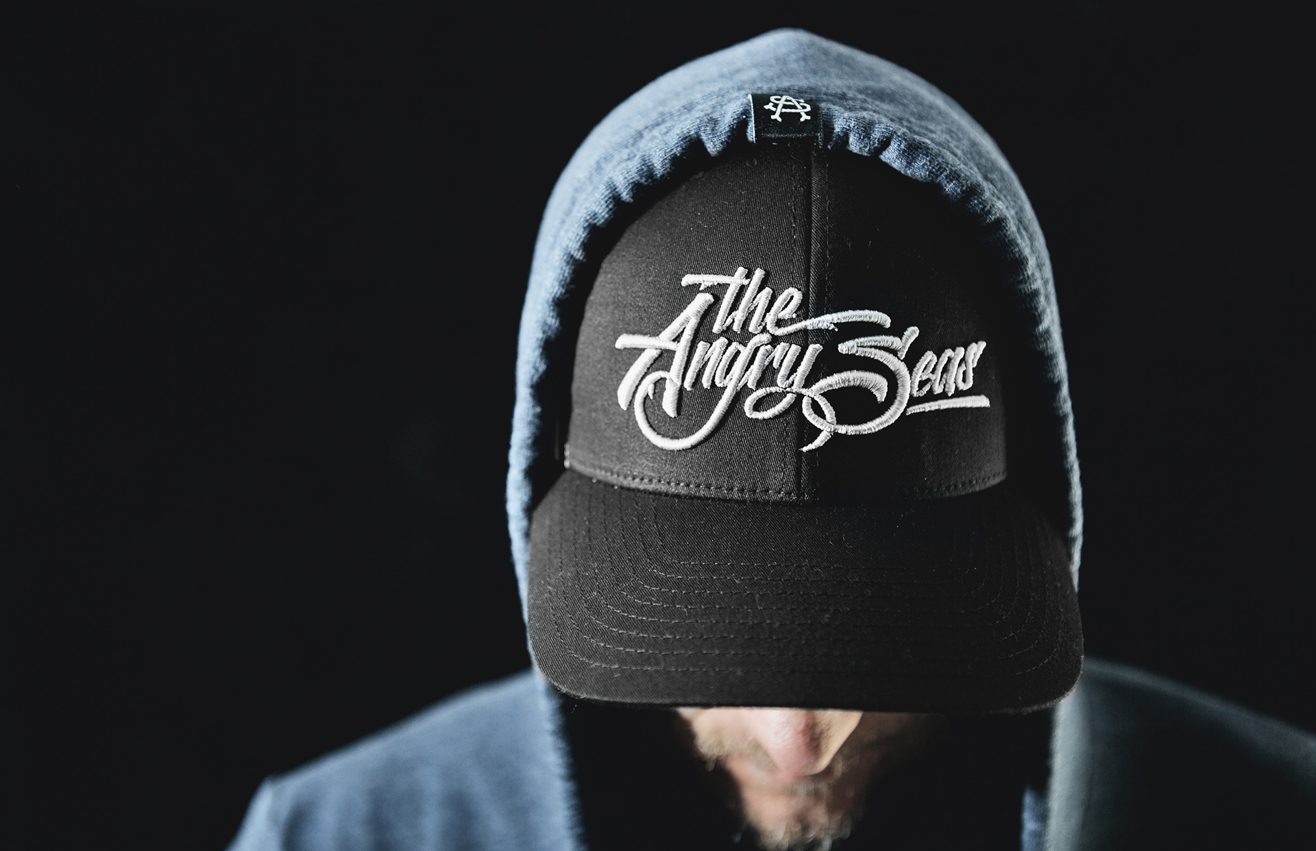 Script logo design on 3D stitch embroidered hat