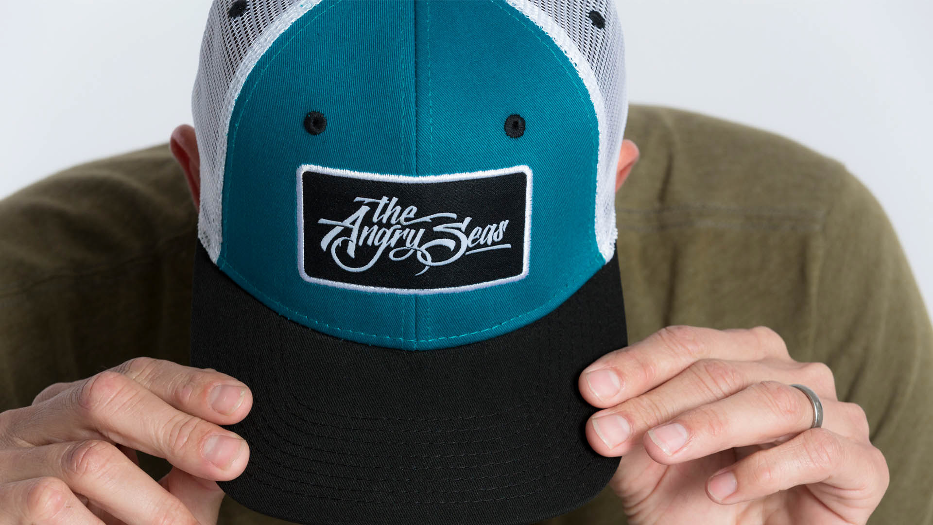 Script logo embroidered hat design