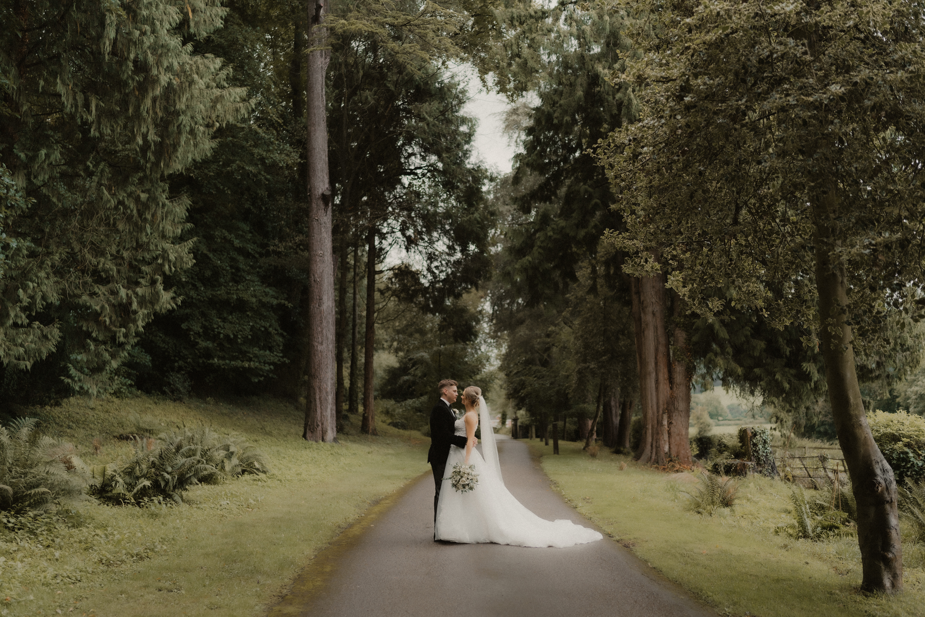 a couple after their summer wedding at Tyn Dwr Hall in Llangollen
