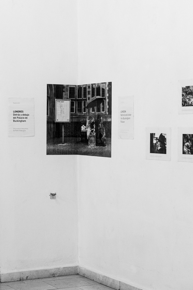 Picture of the frames on the exhibition wall with the caption cheap Black and white Laser printing, A3 plastification and a ridiculous amount of blue-tack in action! gallery arte soy in santiago de cuba, cuba. 2015 © Pedro Rodrigues