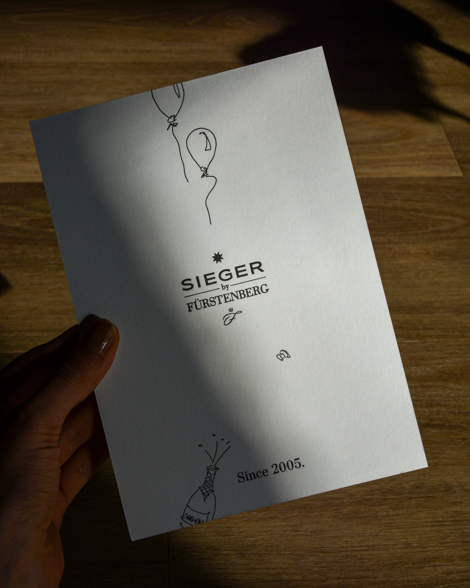 Invitation card for 20s anniversary SIEGER by Fürstenberg