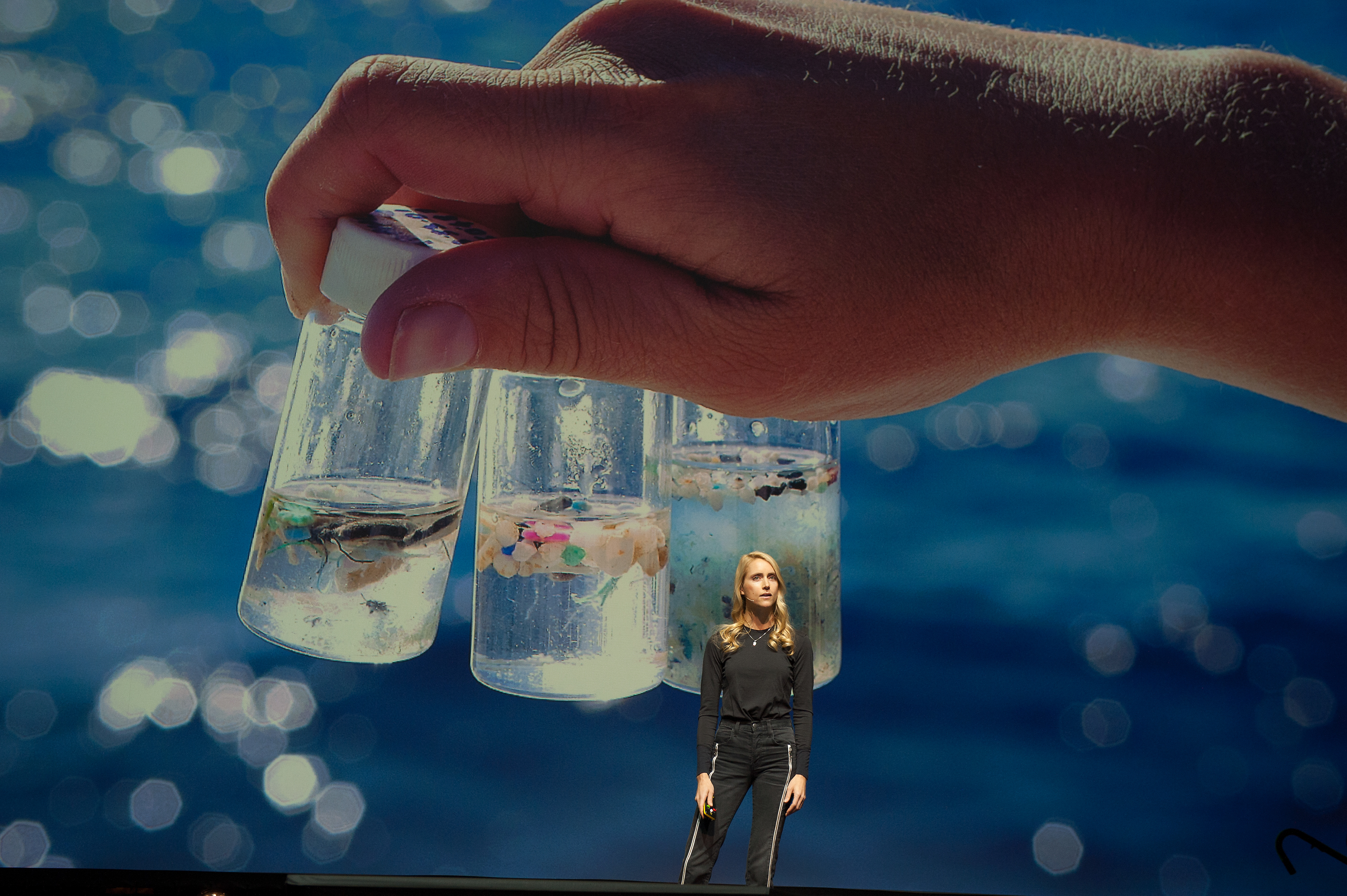 On stage talking about the reality and solutions of hidden microplastics and toxins in our oceans. Photo by Marte Rekaa.