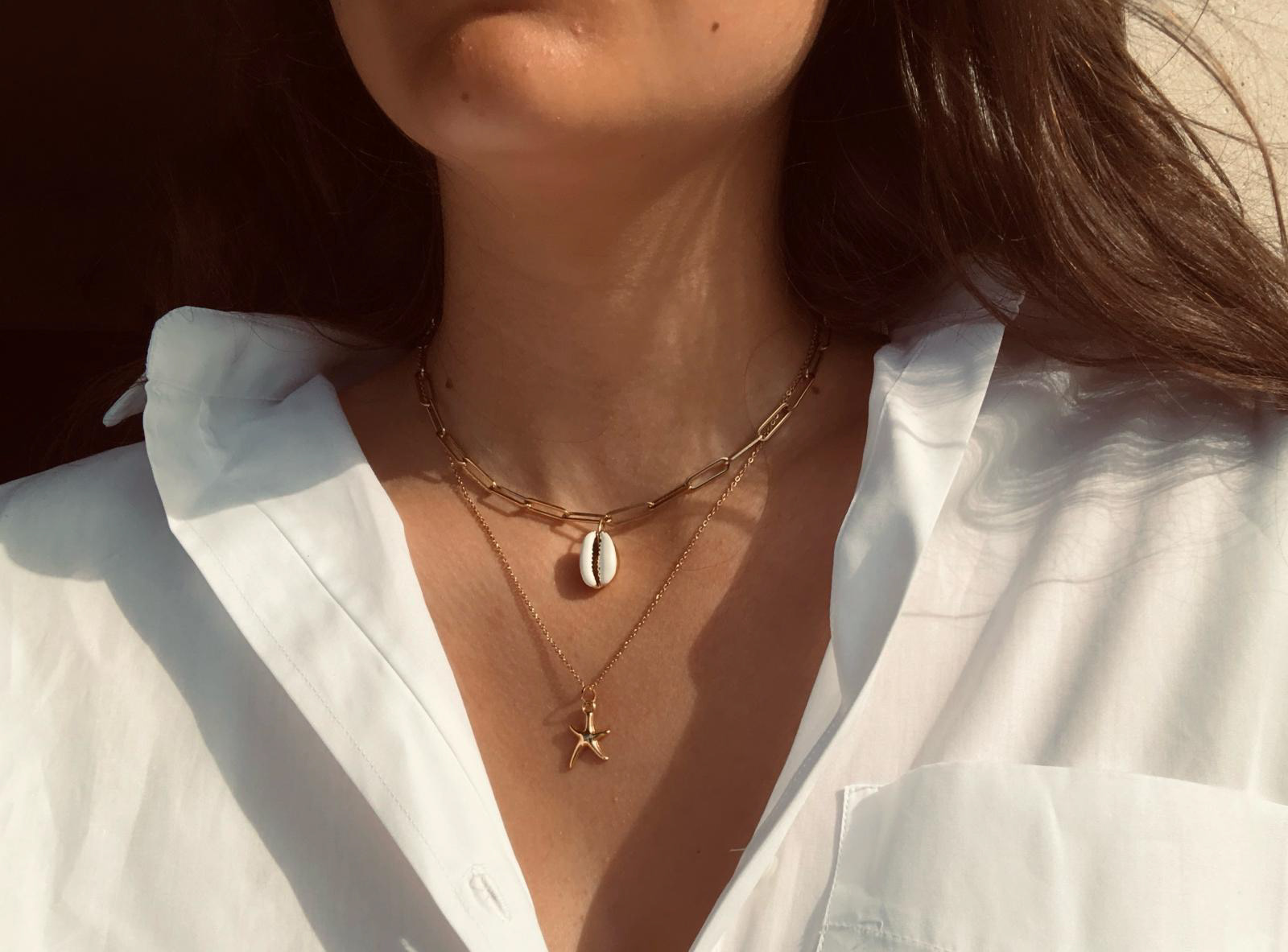 Chain with Shell Necklace €28.- & Golden necklace with star €28.-