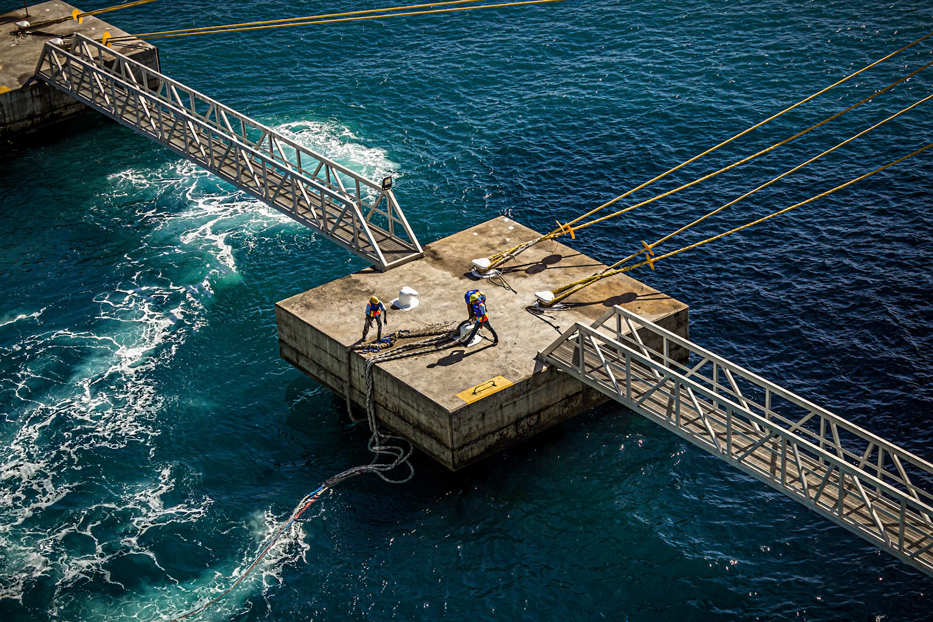 Dock workers mooring cruise ship, Falmouth, Jamaica, 2017