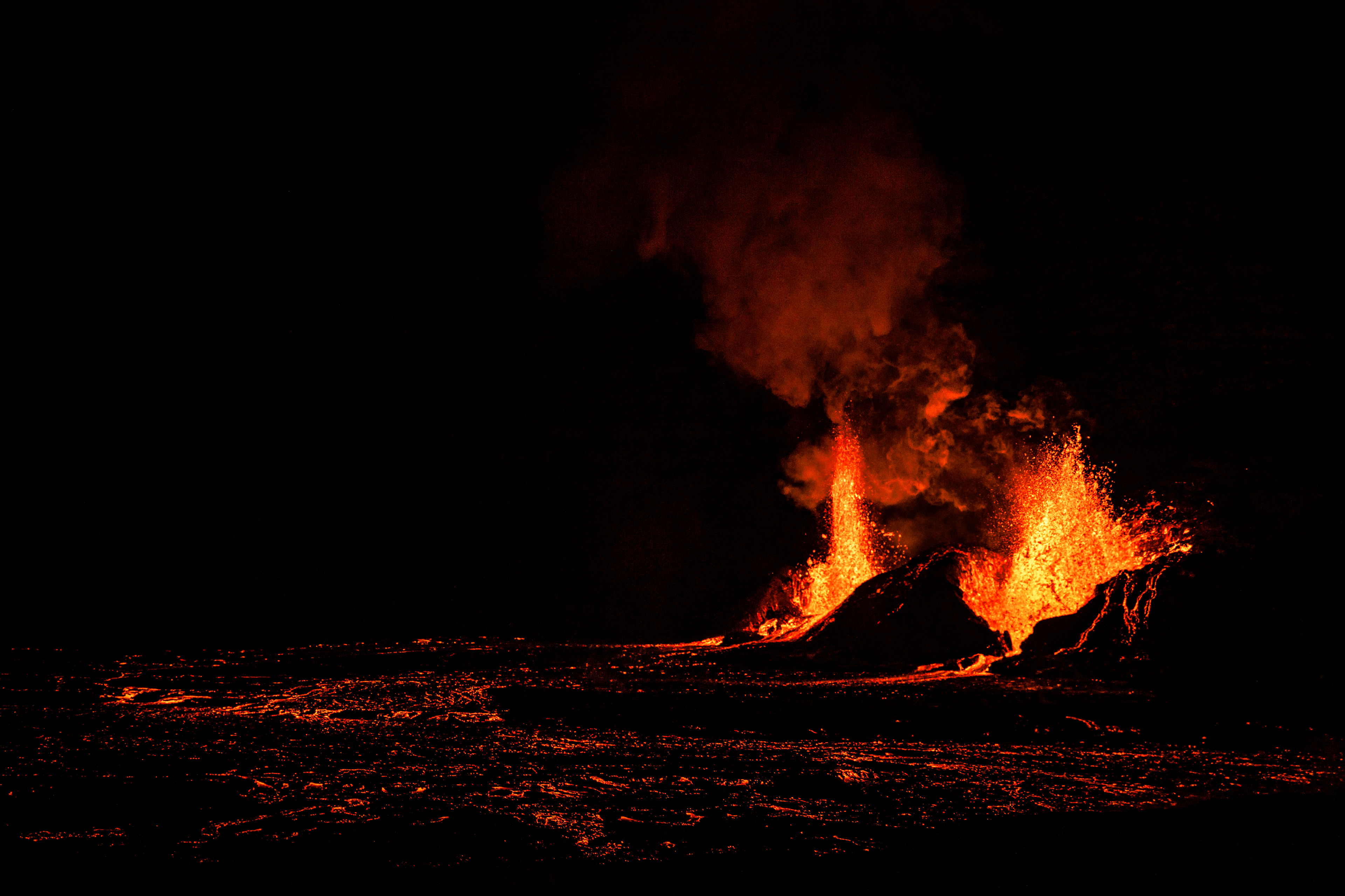 Kīlauea volcano erupting at the summit on February 11, 2025, with bright lava fountains and flows confined to Halemaʻumaʻu crater inside Hawaiʻi Volcanoes National Park.