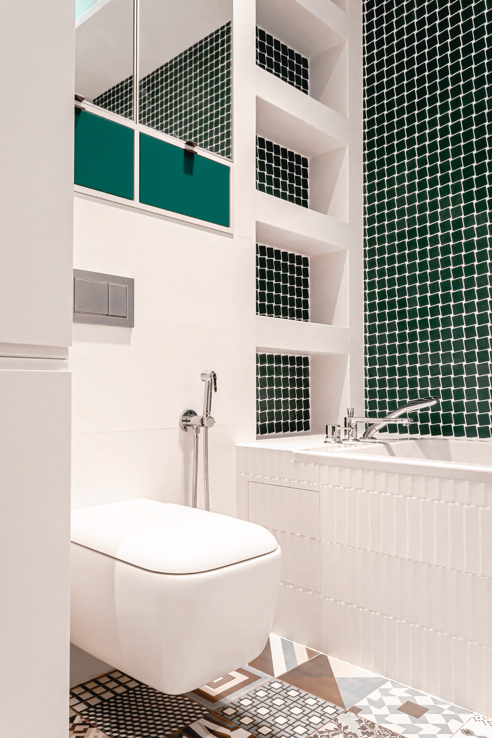 wall mounted toilet bowl with a shower
