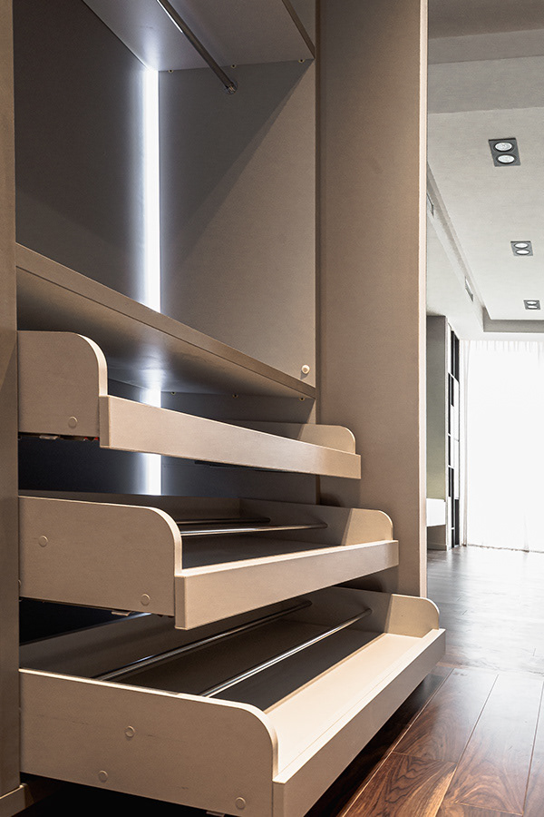 shoe rack in walk-in closet