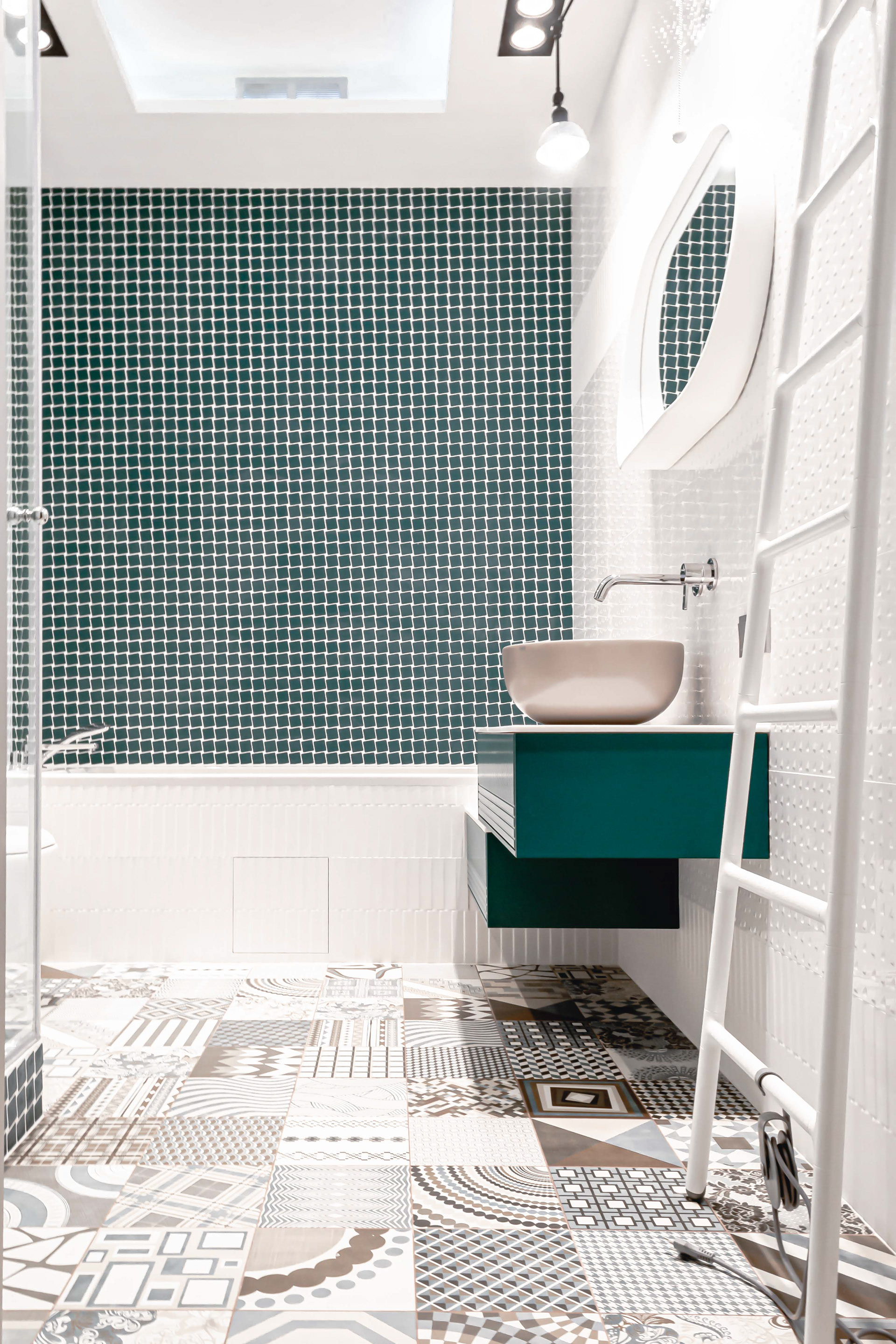 bathroom with green mosaic wall