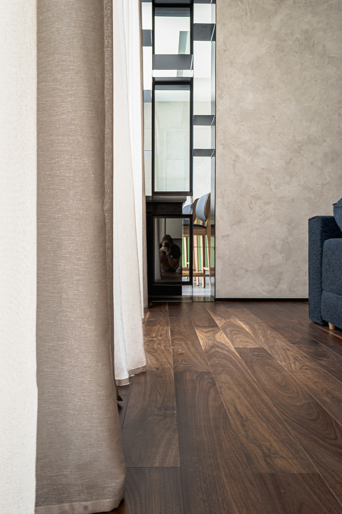 metal shelf . column with marmorino stucco . chestnut hardwood flooring