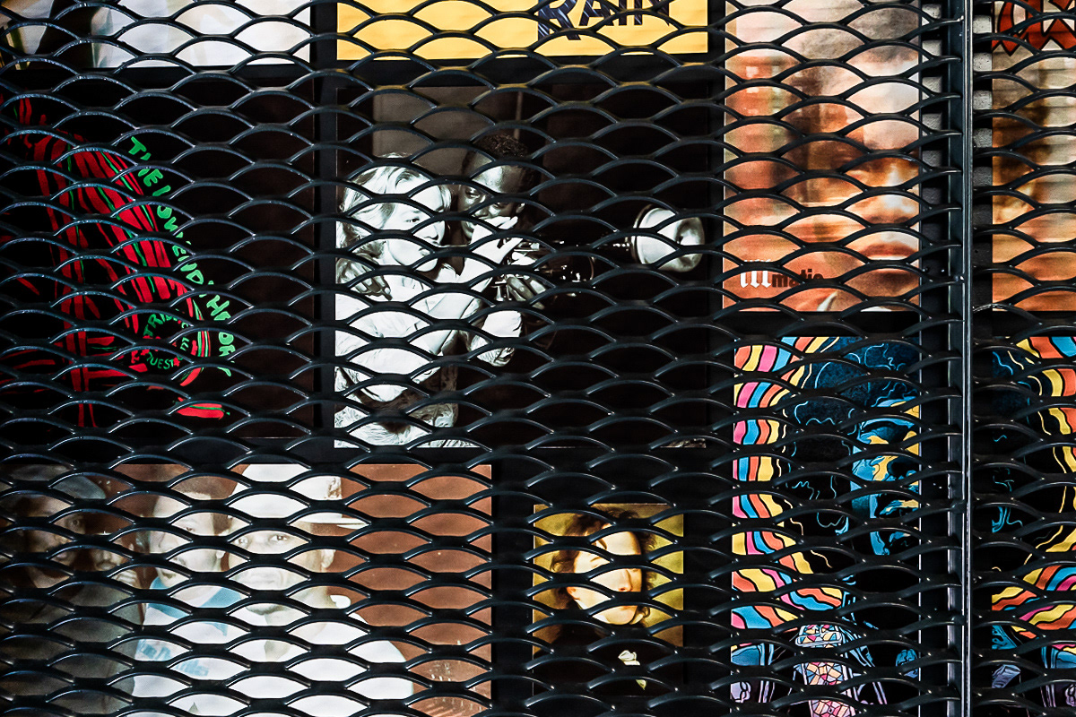 metal mesh with artwork behind