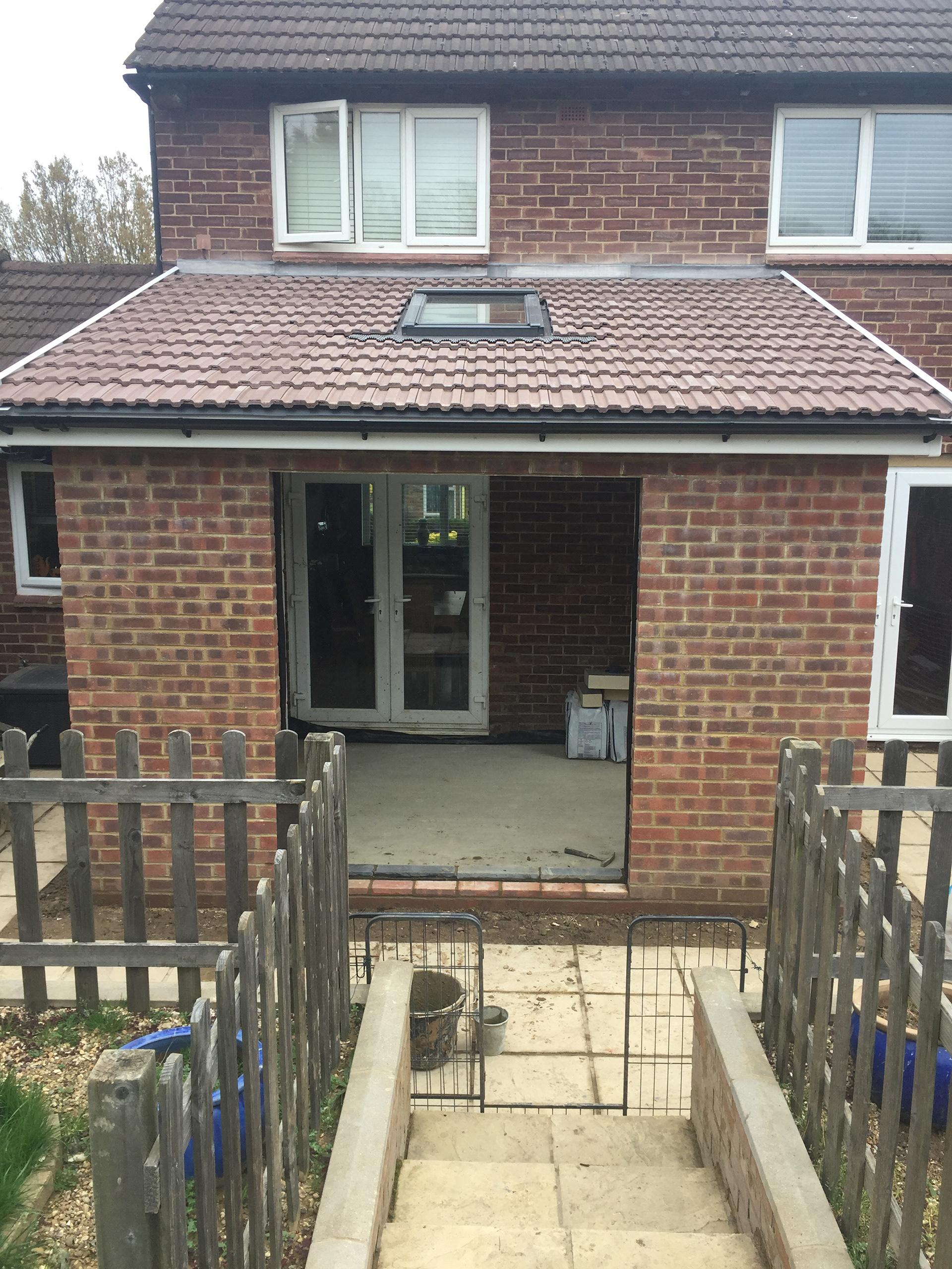 The main structure of the extensions was complete, ready for patio doors and plasteting.