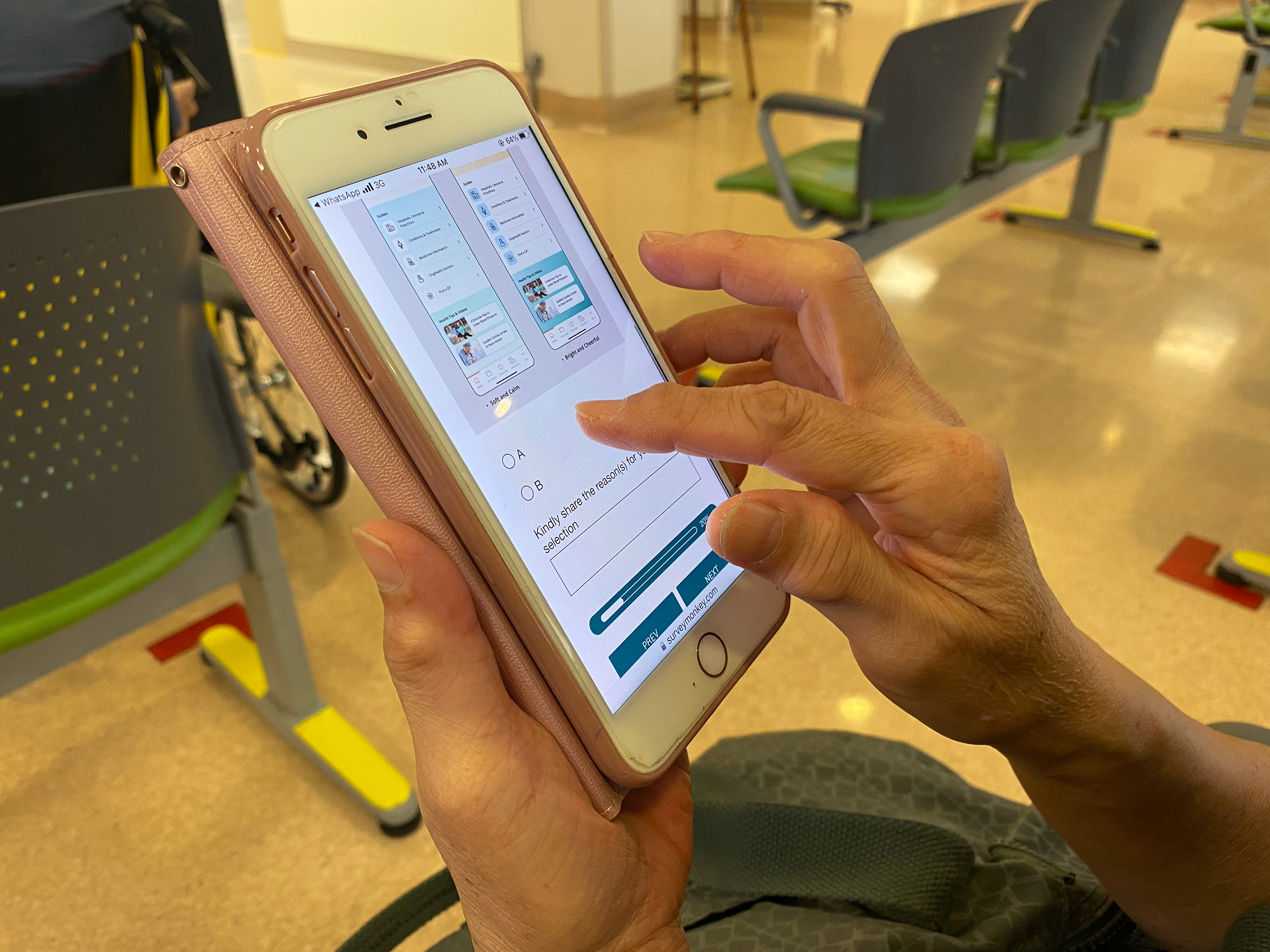 User holding phone with screen showing an A/B test