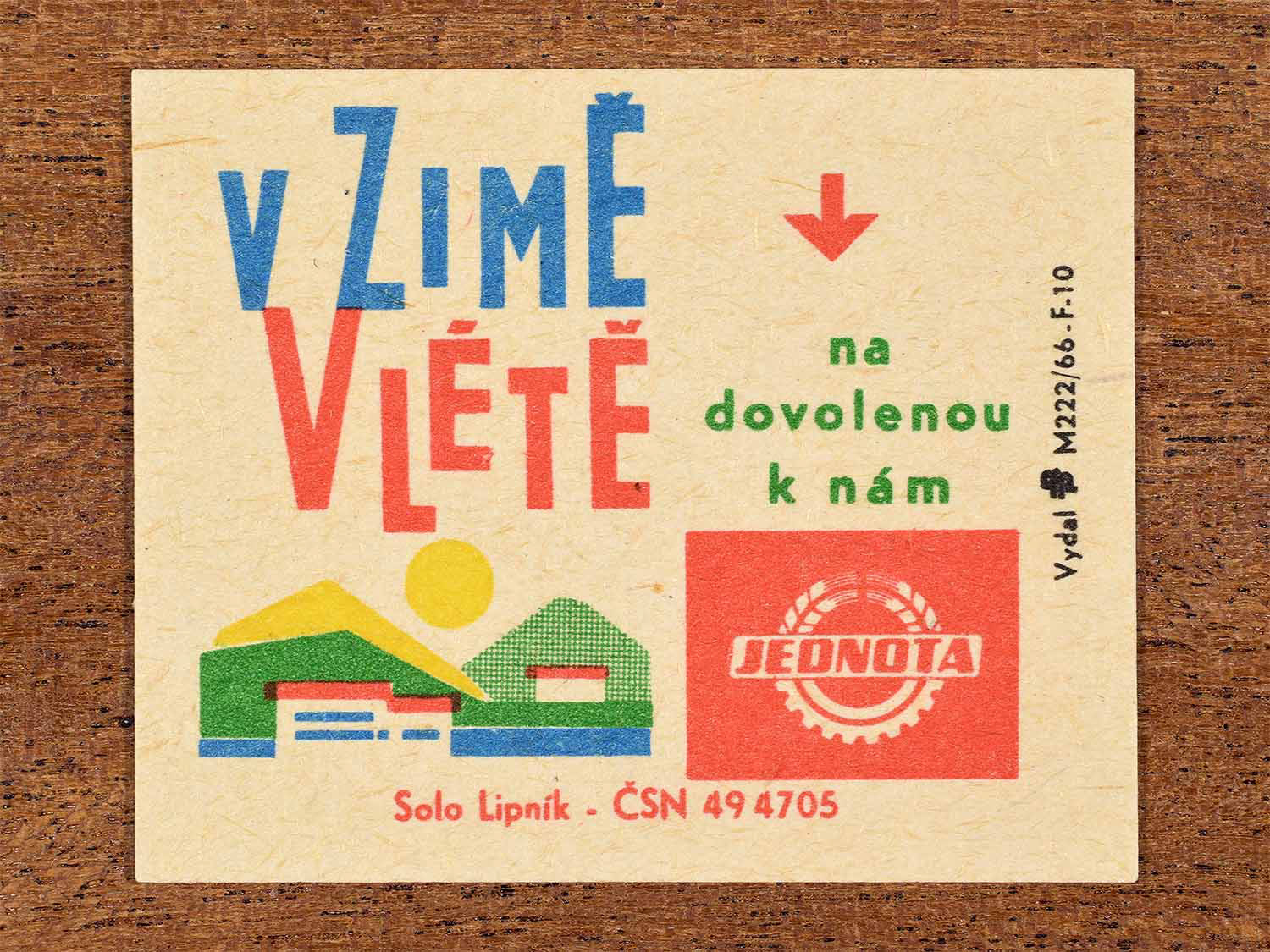 Vintage c. 1966 Czech matchbox label showing stylised holiday buildings and a sun in bright geometric colours. Produced by the Solo Lipník match factory to promote Jednota cooperative holiday facilities.