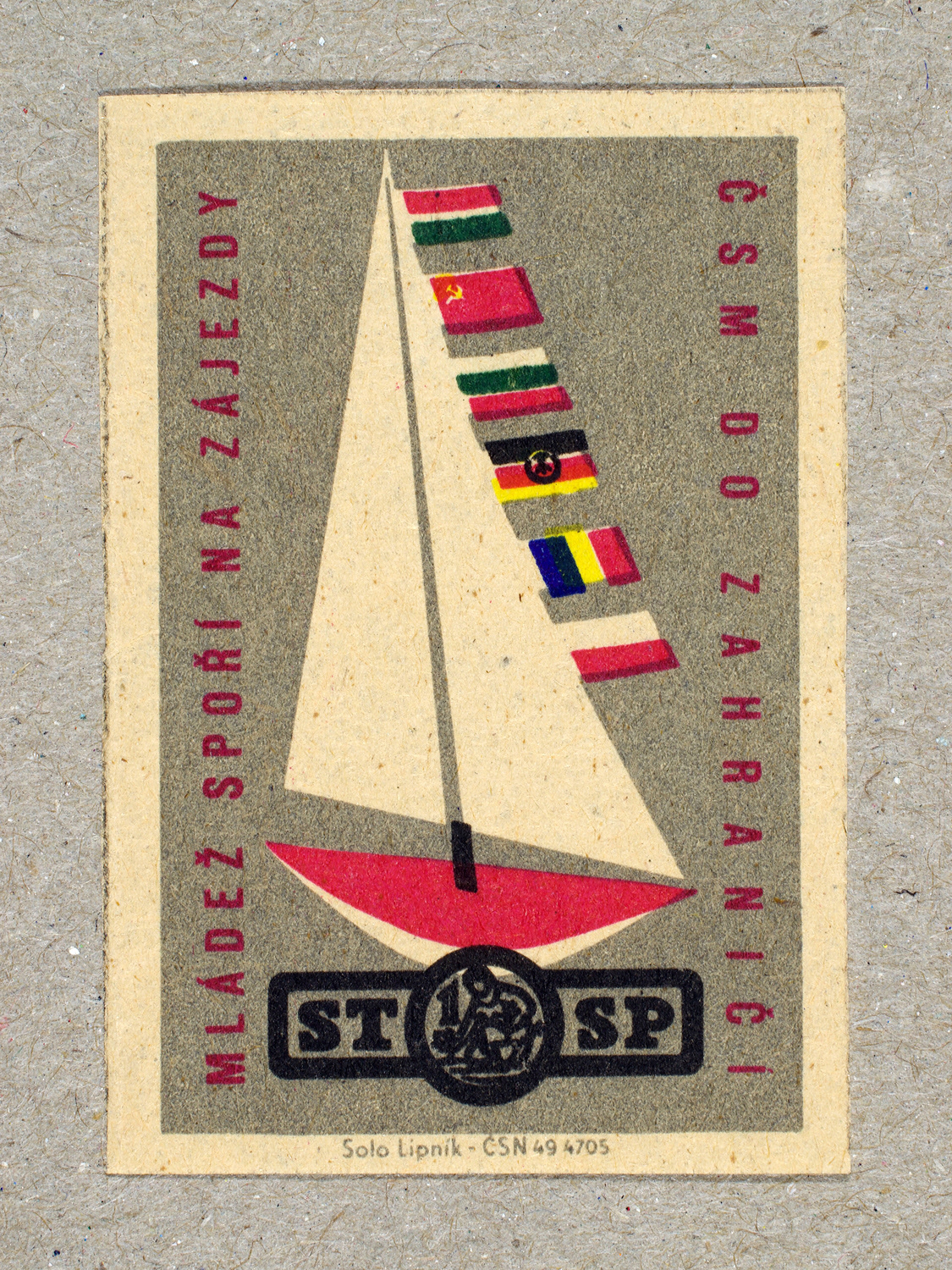 Vintage 1963 Czech matchbox label by Solo Lipník featuring a sailboat with flags from various countries. Part of the 'Savings Bank' series promoting saving money to afford holidays abroad.
