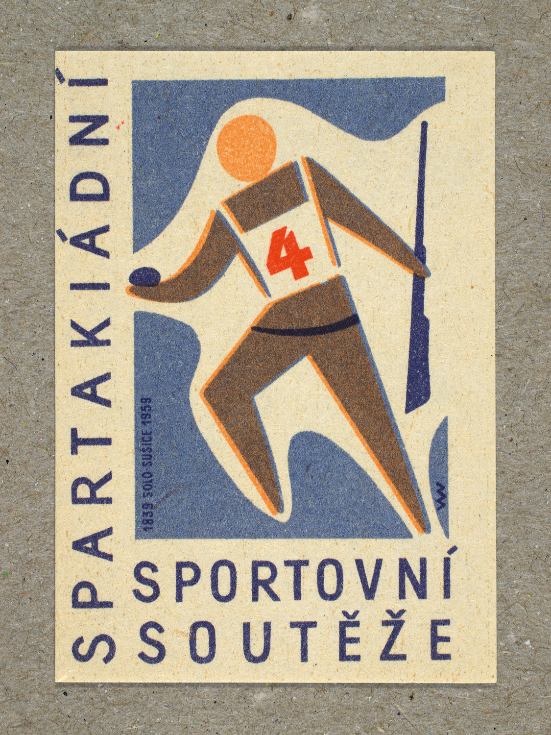 Vintage 1959 Czech matchbox label featuring a stylised figure in a biathlon, in blue and red colours. Produced by Solo Lipník & Solo Sušice match factory to promote the nationwide Spartakiad sports programme in Czechoslovakia.