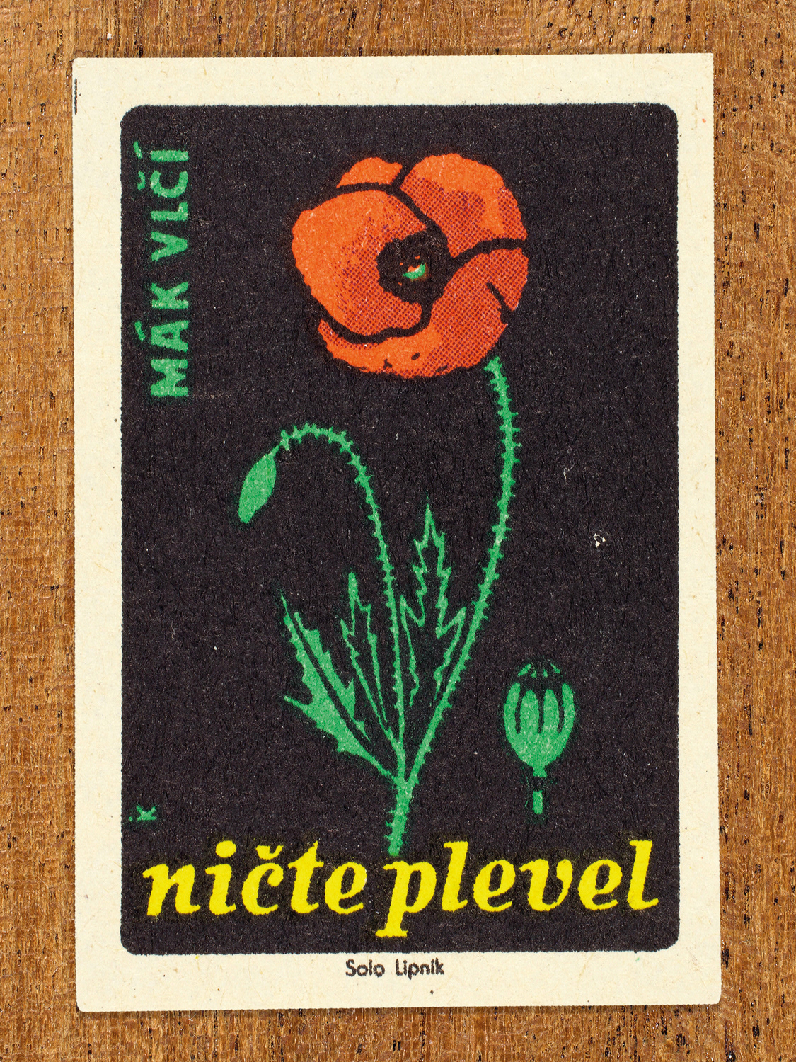 1960 botanical Czech matchbox label by Solo Lipník featuring a bright red poppy. Part of the 'Destroy Weeds' series warning farmers about common field weeds.