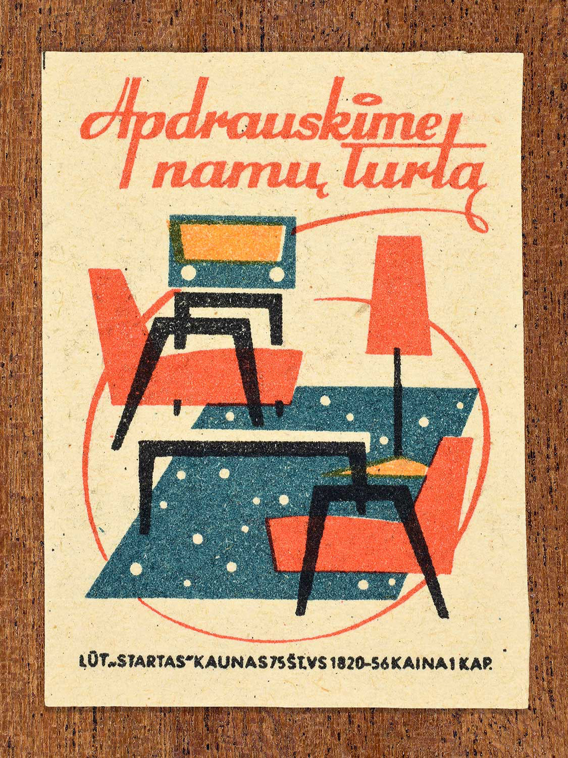 Vintage 1963 Lithuanian matchbox label showing a living room in blue, orange, and black colours. Produced by the Startas Kaunas match factory to promote insurance for household property.