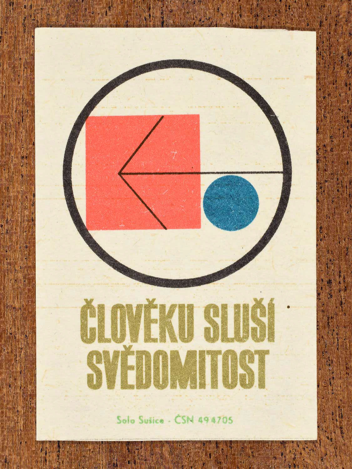 Vintage c. 1966 Czech matchbox label showing geometric forms enclosed within a circular frame. Produced by the Solo Sušice match factory to promote conscientiousness, responsibility, and disciplined behaviour.