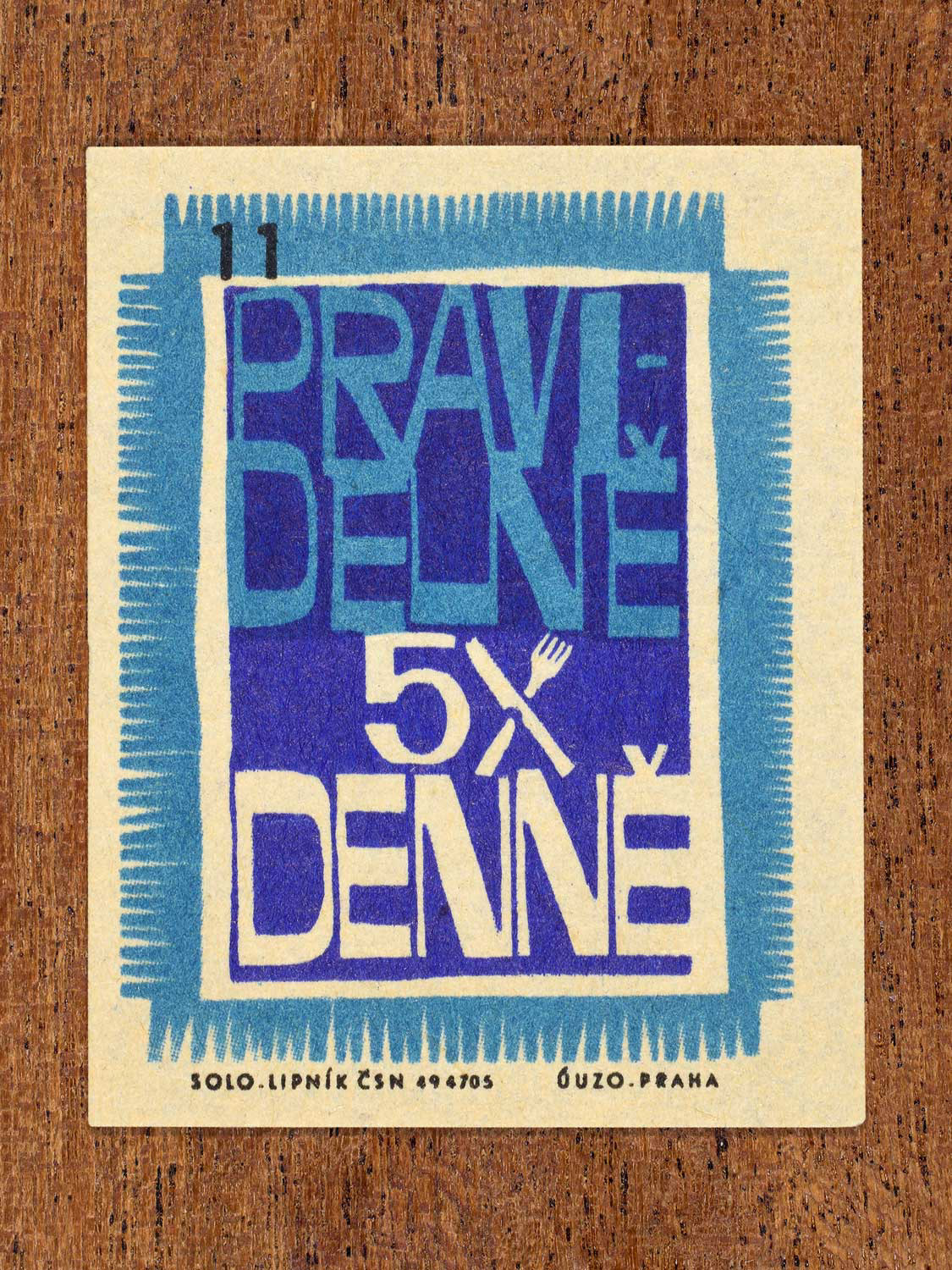 Vintage c. 1965 Czech matchbox label showing a typographic design promoting the health benefits of proper nutrition, daily meal routines, and everyday household habits. Produced by Solo Lipník match factory.