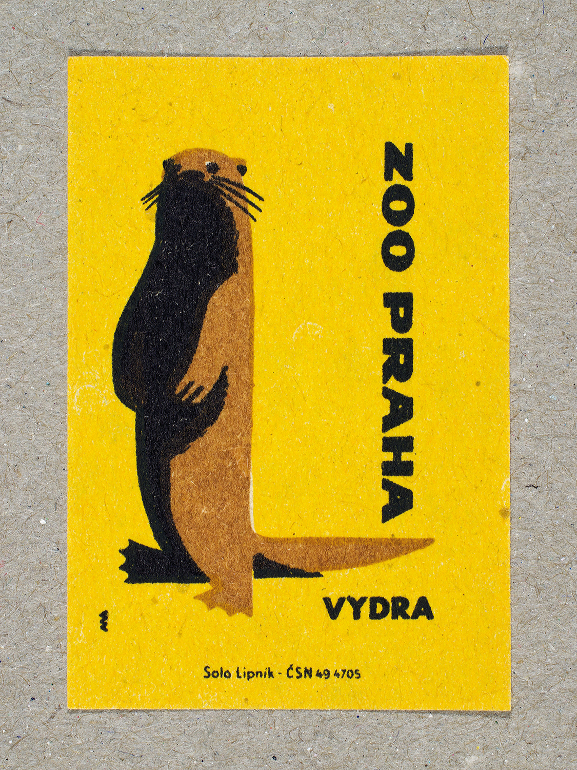 Vintage 1963 Czech matchbox label by Solo Lipník featuring a otter on a yellow background. Part of the 'Zoo Praha' series advertising Prague Zoo in Czechoslovakia.