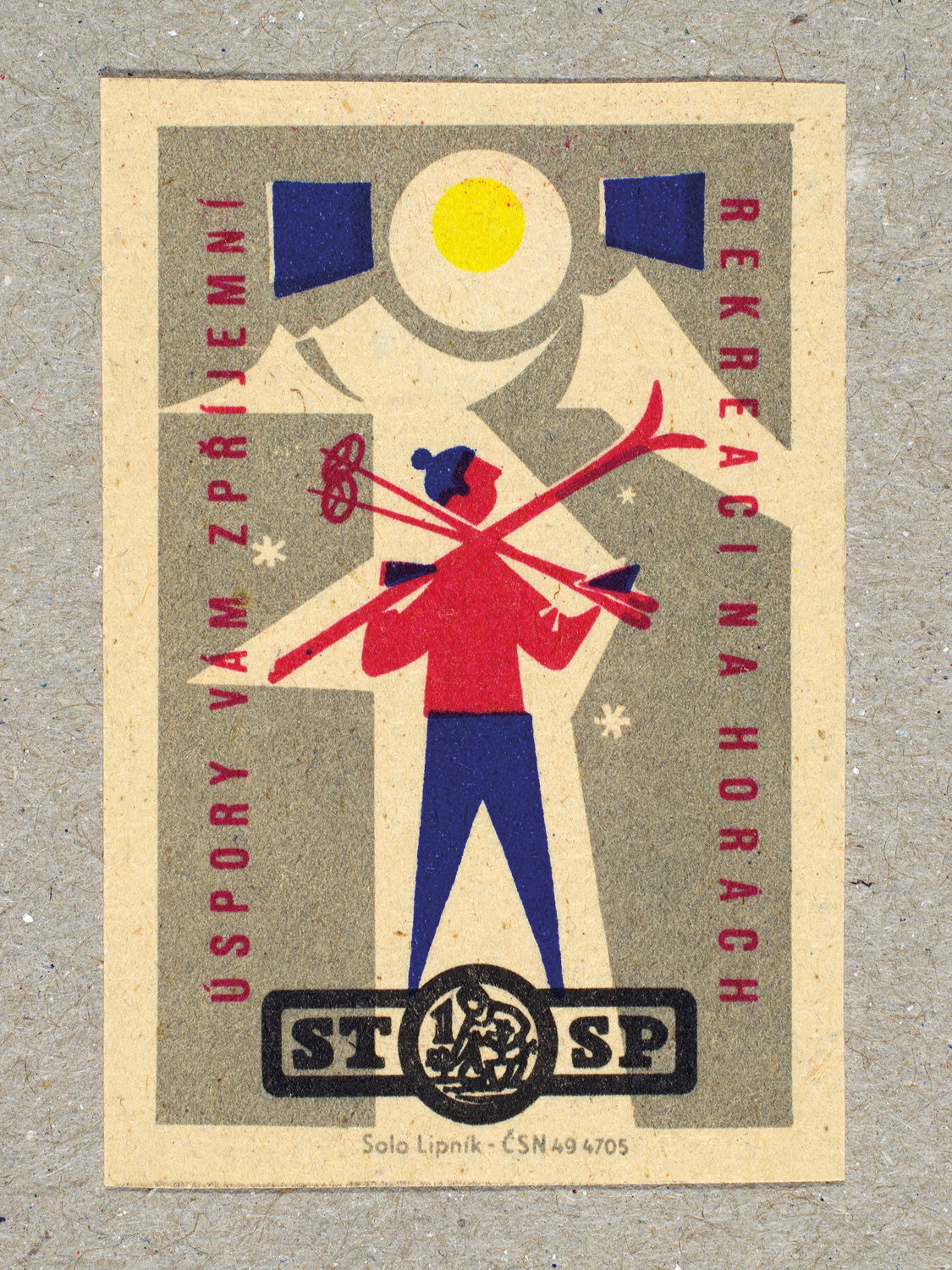 Vintage 1963 Czech matchbox label by Solo Lipník featuring a stylised figure holding skis and looking towards a snowy mountain. Part of the 'Savings Bank' series reminding citizens to save for financial security and future prosperity.