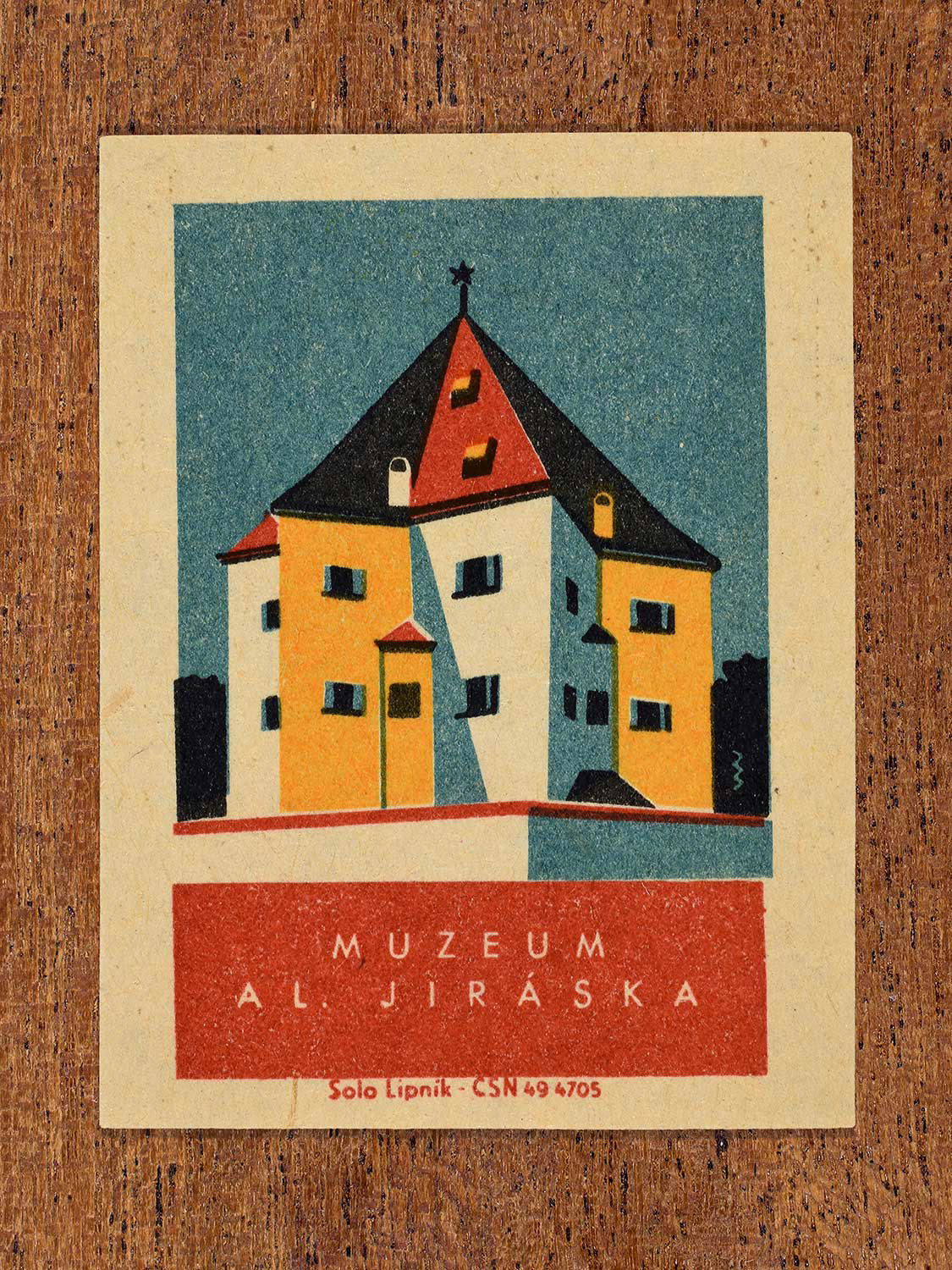 Vintage 1964 Czechoslovakia matchbox label showing the Muzeum Al. Jiráska (Museum of Alois Jirásek) in yellow, red and teal colours. Produced by the Solo Lipník match factory to promote domestic historical heritage and municipal institutions across the state.