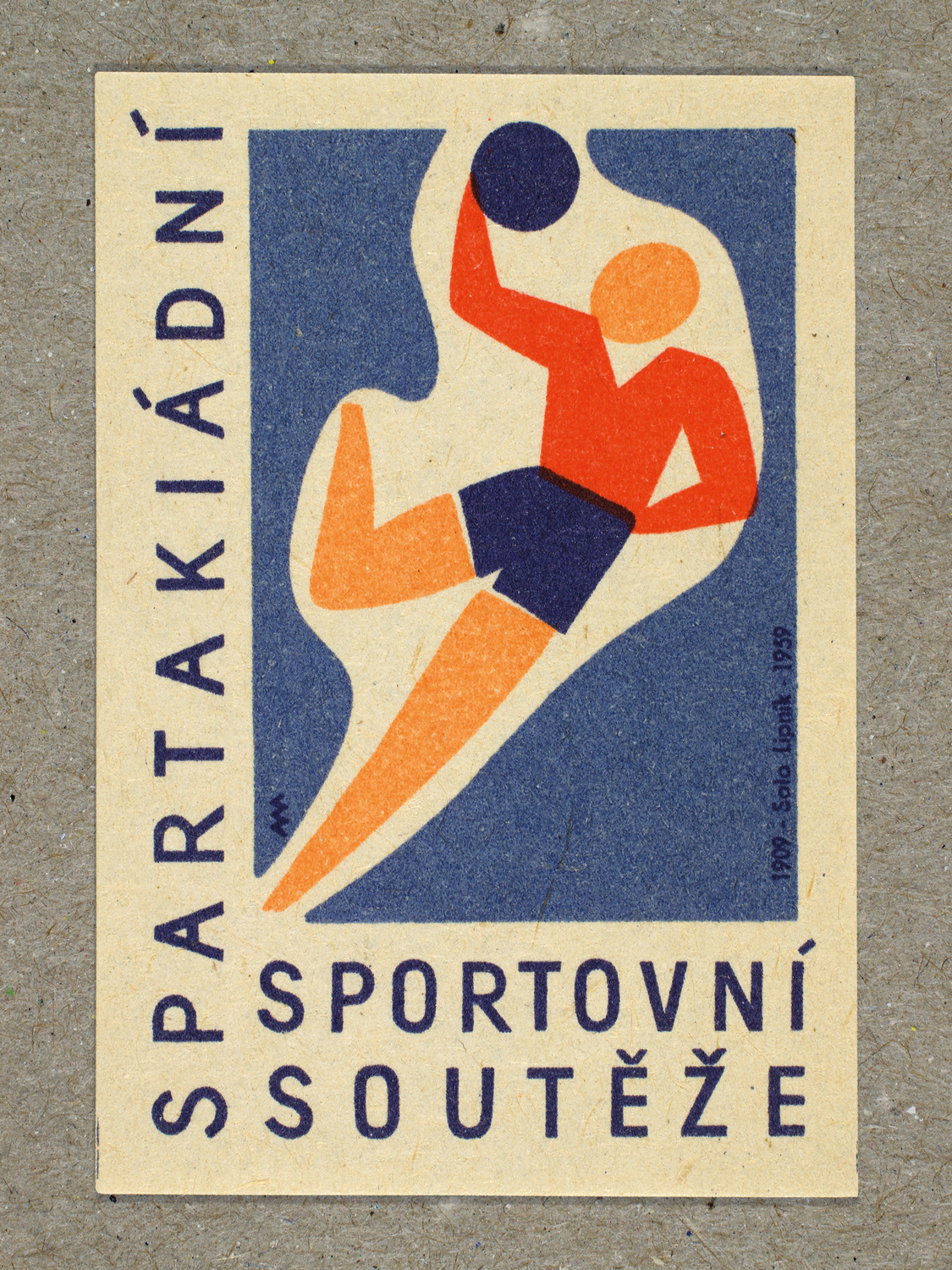 Vintage 1959 Czech matchbox label featuring a stylised figure jumping while playing handball, in blue and red colours. Produced by Solo Lipník & Solo Sušice match factory to promote the nationwide Spartakiad sports programme in Czechoslovakia.