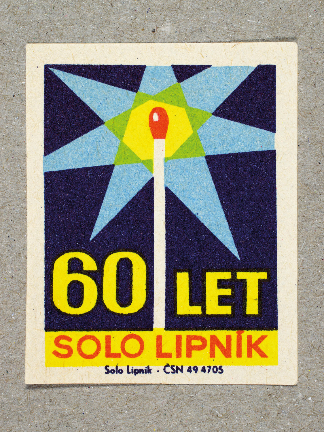 Vintage 1969 Czech matchbox label by Solo Lipník featuring an abstract matchstick design in blue and yellow colours. Part of the 'SOLO Lipník Anniversary' series advertising the Czechoslovakian match factory.