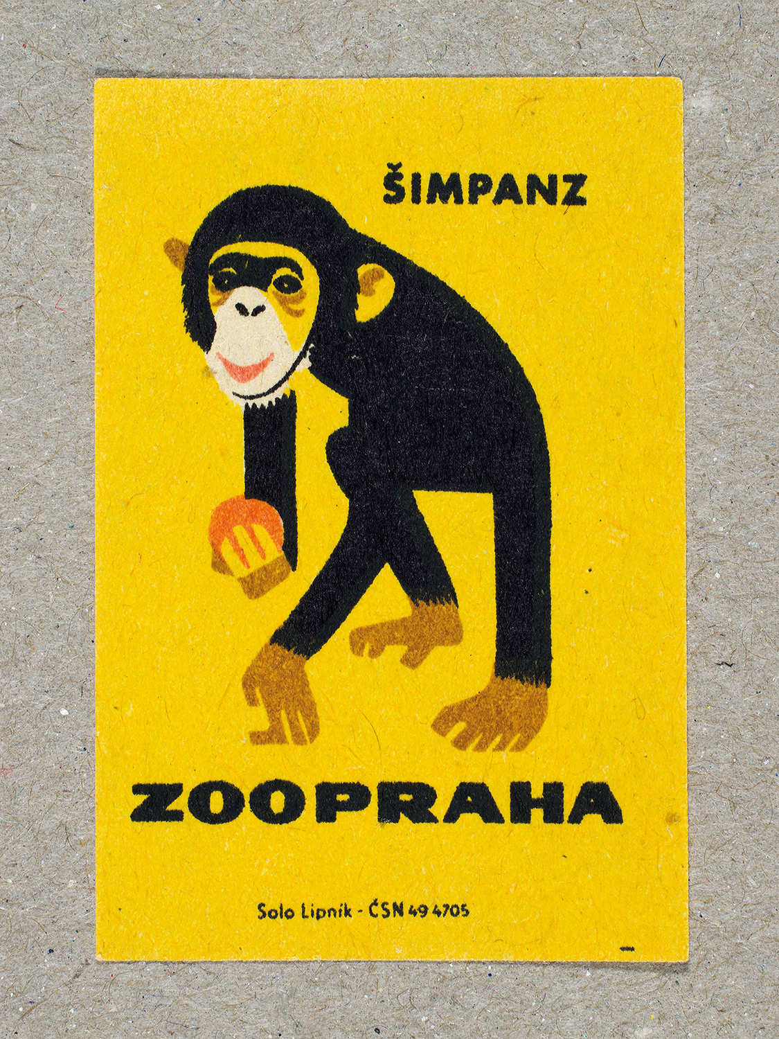 Vintage 1963 Czech matchbox label by Solo Lipník featuring a chimpanzee on a yellow background. Part of the 'Zoo Praha' series advertising Prague Zoo in Czechoslovakia.