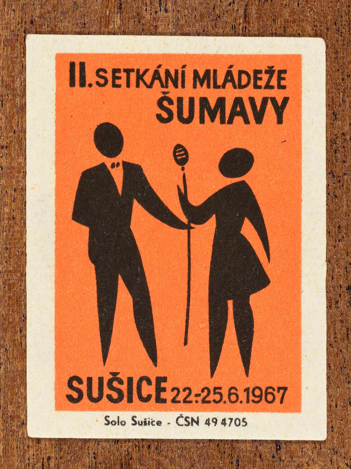 Vintage 1967 Czech matchbox label showing two youths singing at a microphone. Produced by the Solo Sušice match factory to promote organised cultural performances at a youth festival.
