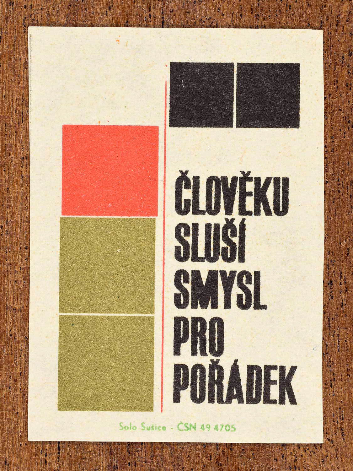 Vintage c. 1966 Czech matchbox label showing stacked and aligned colour blocks forming an orderly geometric arrangement. Produced by the Solo Sušice match factory to promote order, organisation, and structured personal conduct.