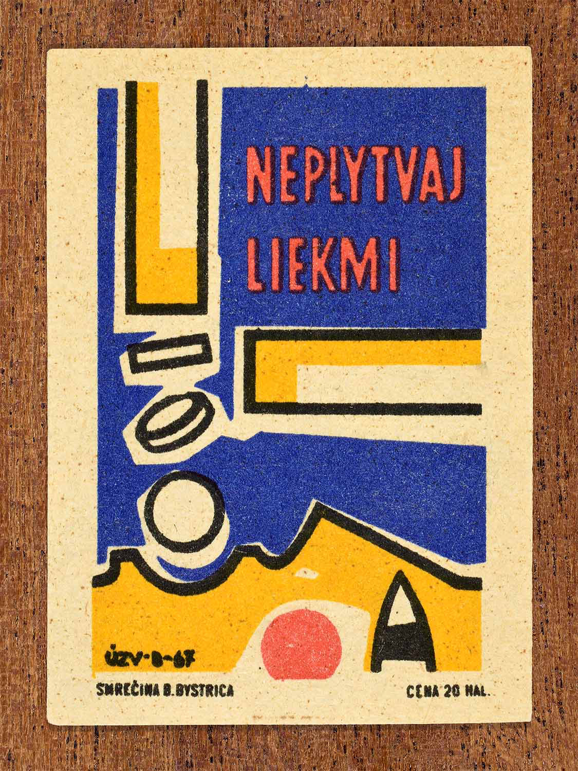 Vintage 1967 Czech matchbox label showing pills falling into a face and open mouth, in yellow, blue and red colours. Produced by the Smrečná match factory, Banská Bystrica, to promote responsible and economical use of medicines.