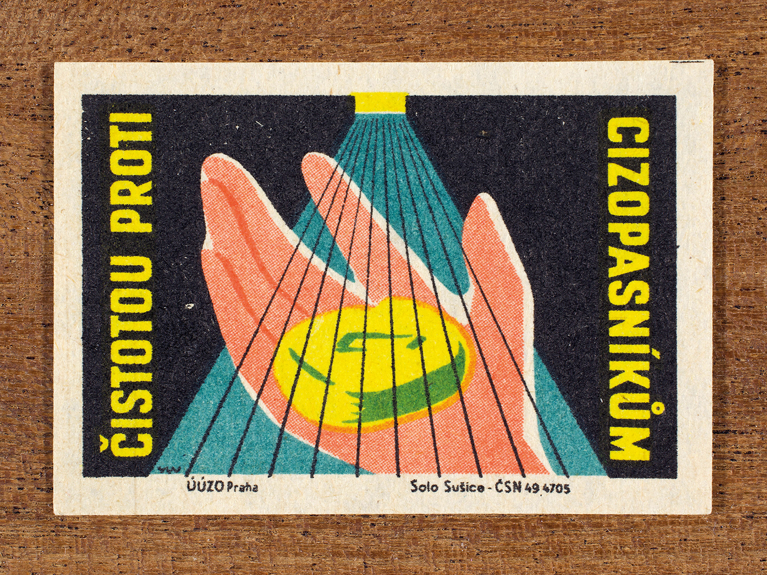 Vintage 1962 Czech matchbox label by Solo Sušice featuring a hand holding soap under running water. Part of the 'Food Handling' series encouraging personal hygiene as protection against disease.
