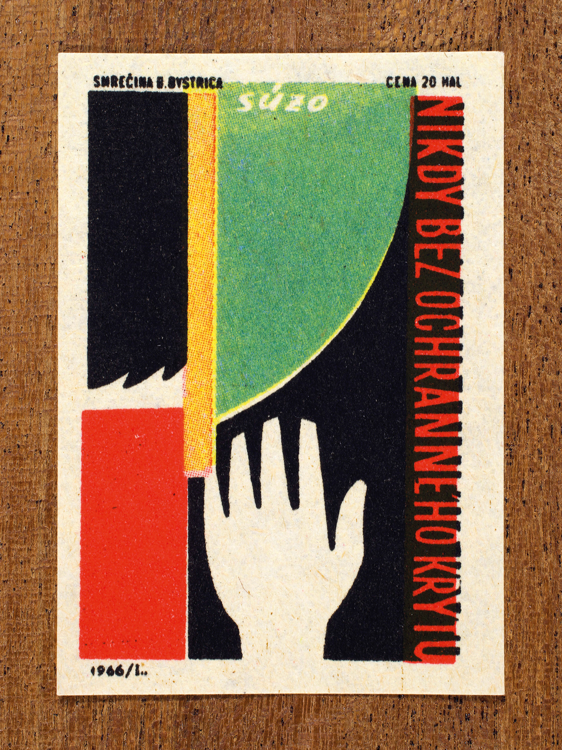 Vintage 1966 Czech matchbox label by Solo Smrečina B. Bystrica featuring a hand raised below a guard covering a spinning blade. It promotes the importance of using protective guards and safety coverings when operating machinery.