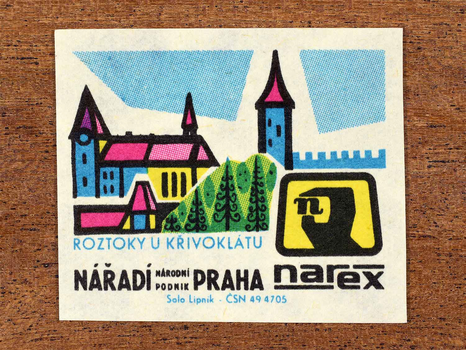Vintage 1967 Czech matchbox label showing castle architecture with towers and fortified walls in multiple bright colours. Produced by the Solo Lipník match factory to promote Roztoky and Narex, the national tool enterprise in Czechoslovakia.
