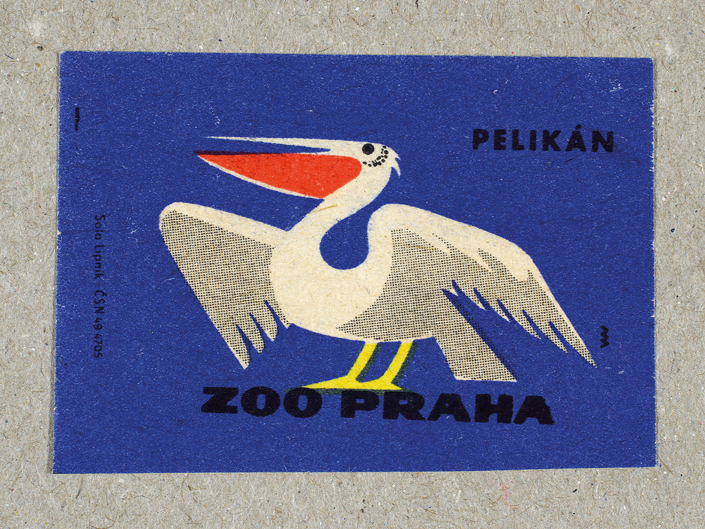 Vintage 1963 Czech matchbox label by Solo Lipník featuring a pelican bird on a blue background. Part of the 'Zoo Praha' series advertising Prague Zoo in Czechoslovakia.