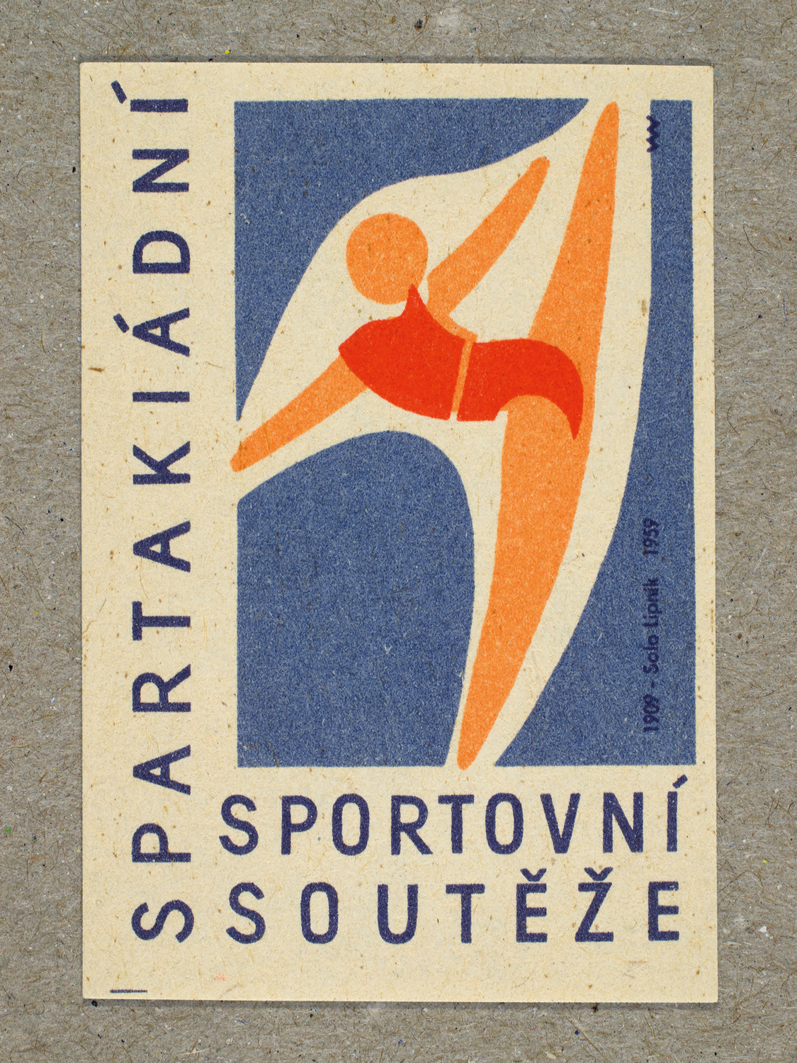 Vintage 1959 Czech matchbox label featuring a stylised figure performing the standing splits, in blue and red colours. Produced by Solo Lipník & Solo Sušice match factory to promote the nationwide Spartakiad sports programme in Czechoslovakia.