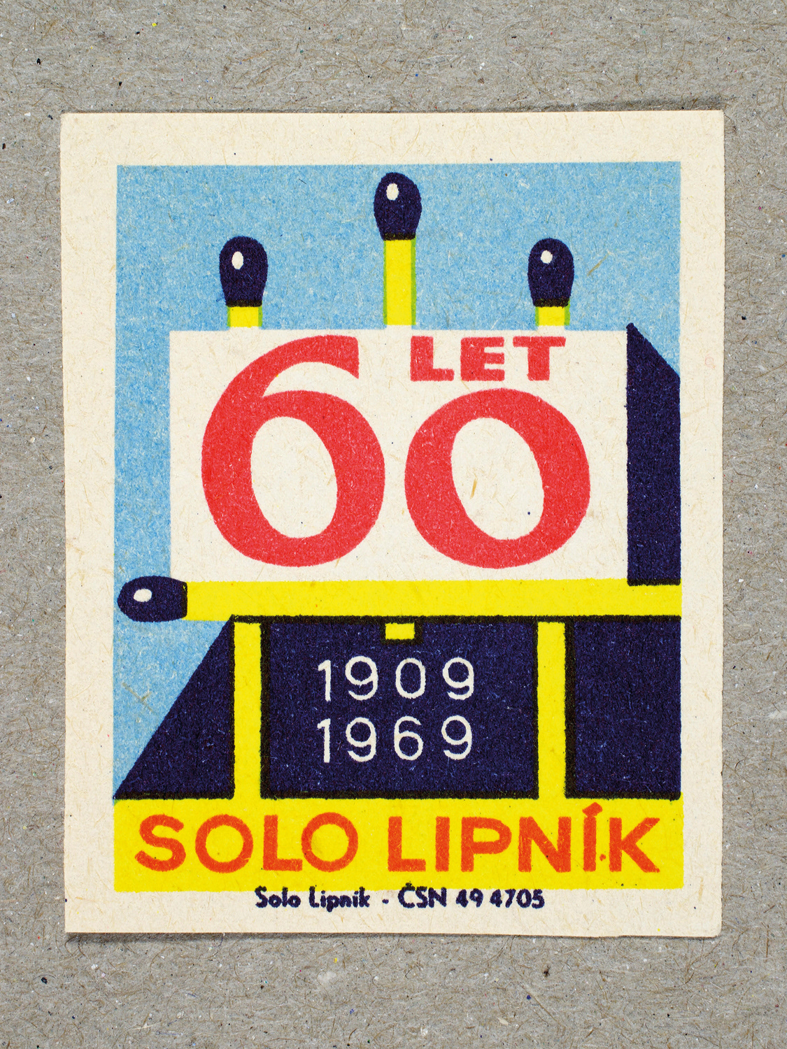 Vintage 1969 Czech matchbox label by Solo Lipník featuring multiple matches and a matchbox in blue and yellow colours. Part of the 'SOLO Lipník Anniversary' series advertising the Czechoslovakian match factory.