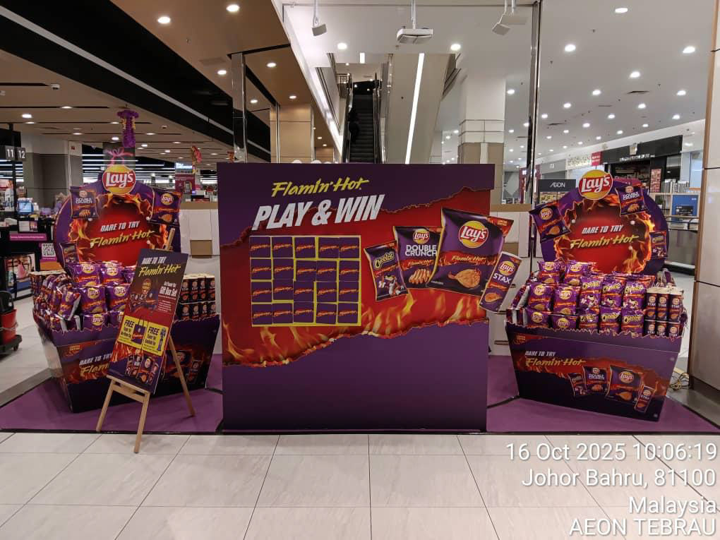 The Play & Win engagement zone — a scratch-card-style game grid turning the dare into participation, with a Flamin' Hot Hand-Drawn Gift Box Set as the prize.