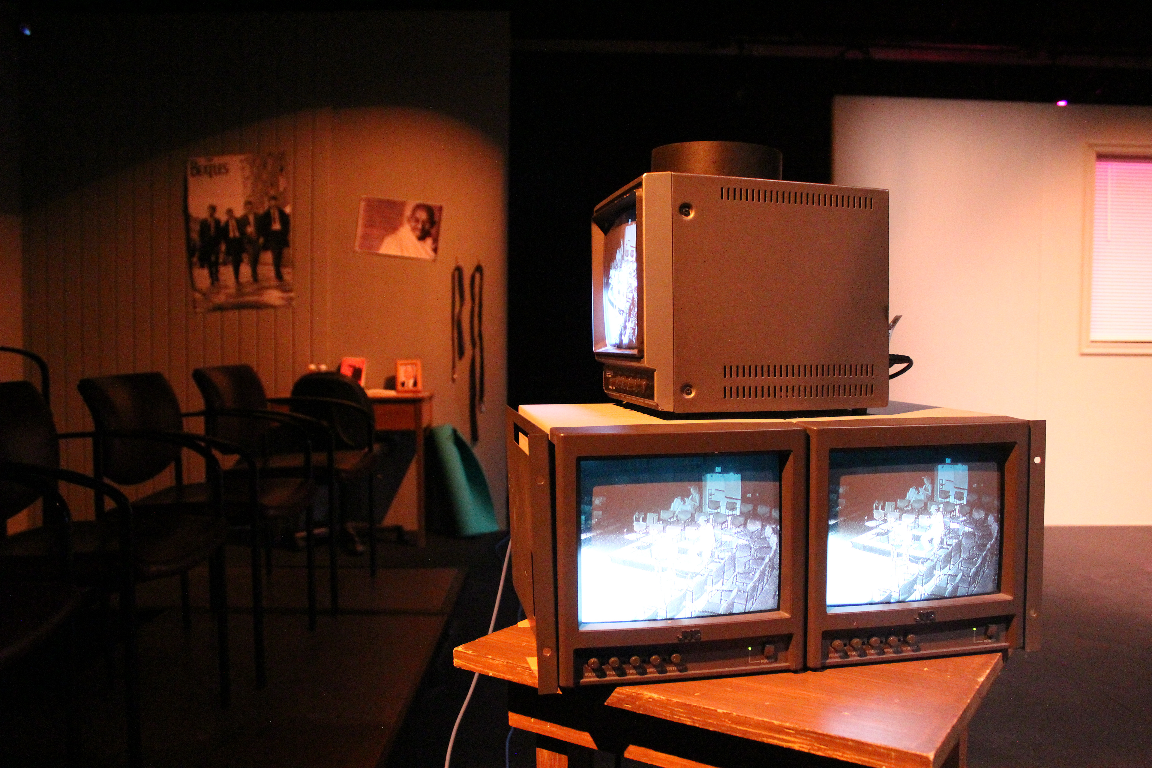 Cameras placed around the blackbox capture a live feed of the audience during the performances