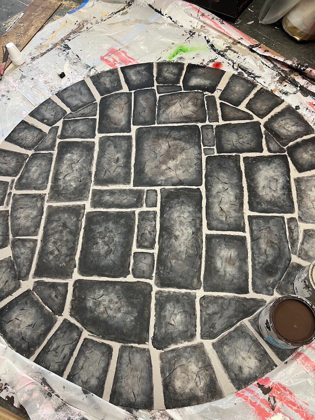 Hand painted stone patterns to suggest medieval style towers