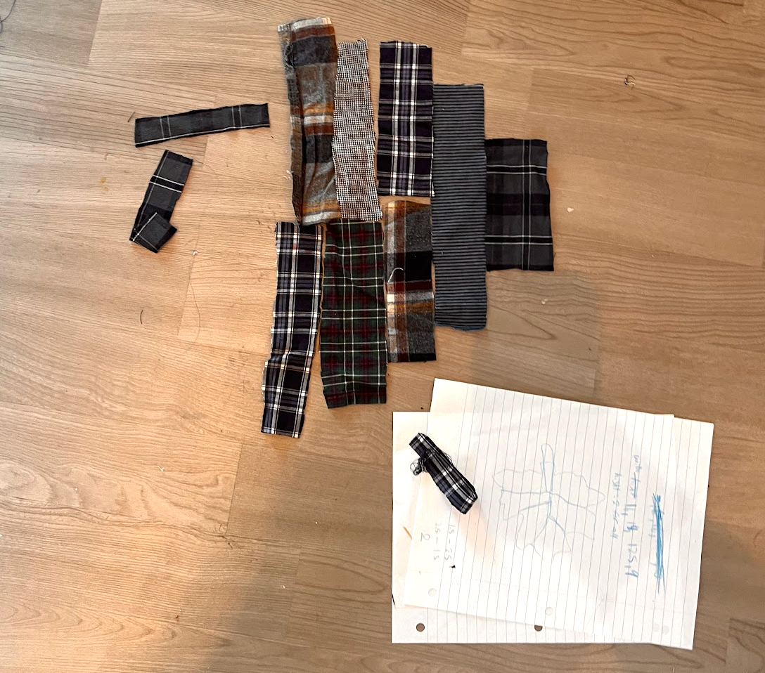 Mapping out fabric for the front panel on Leaf's overalls