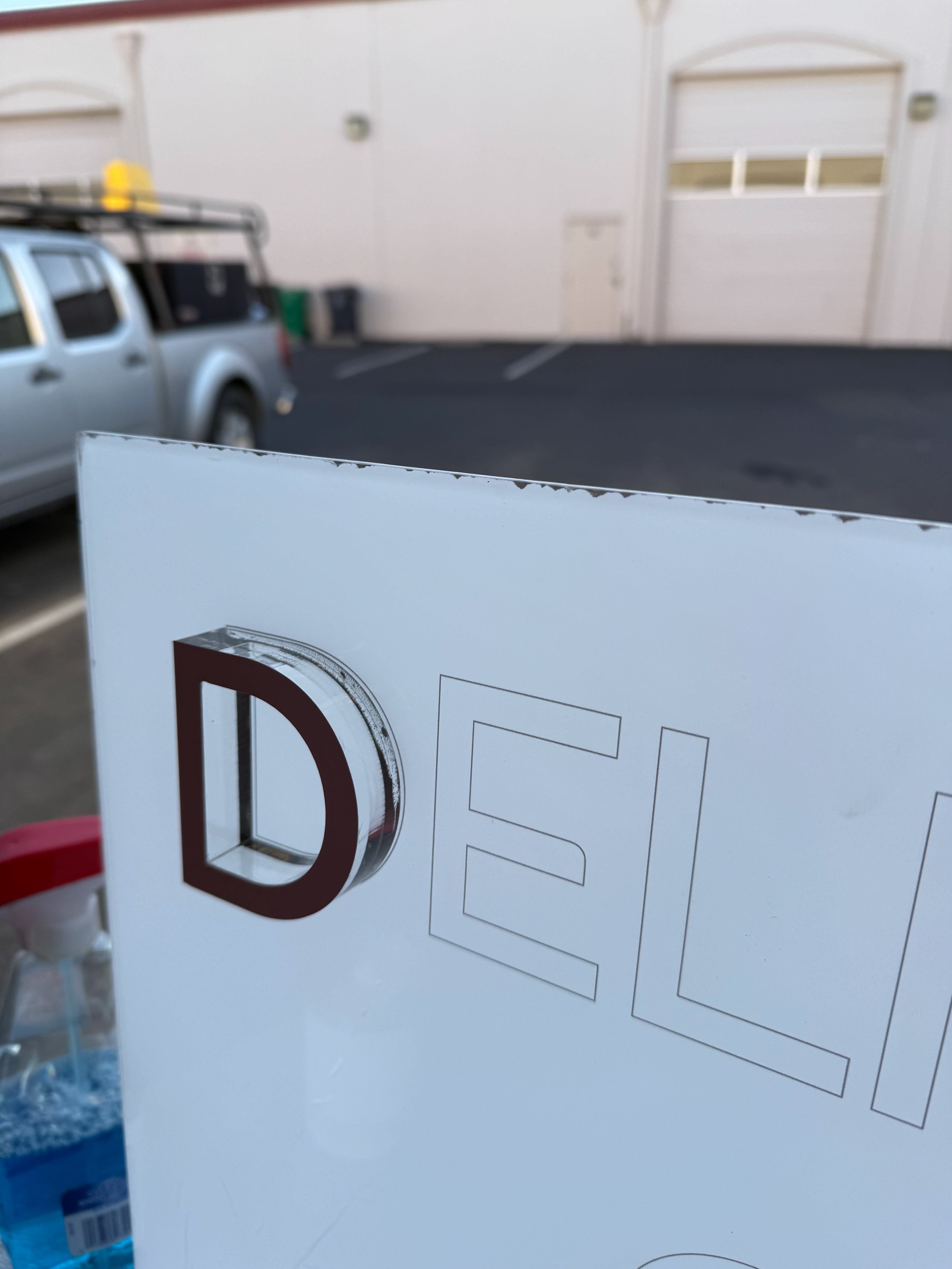 1/4" Clear Acrylic with White Vinyl on top of Outlined Text