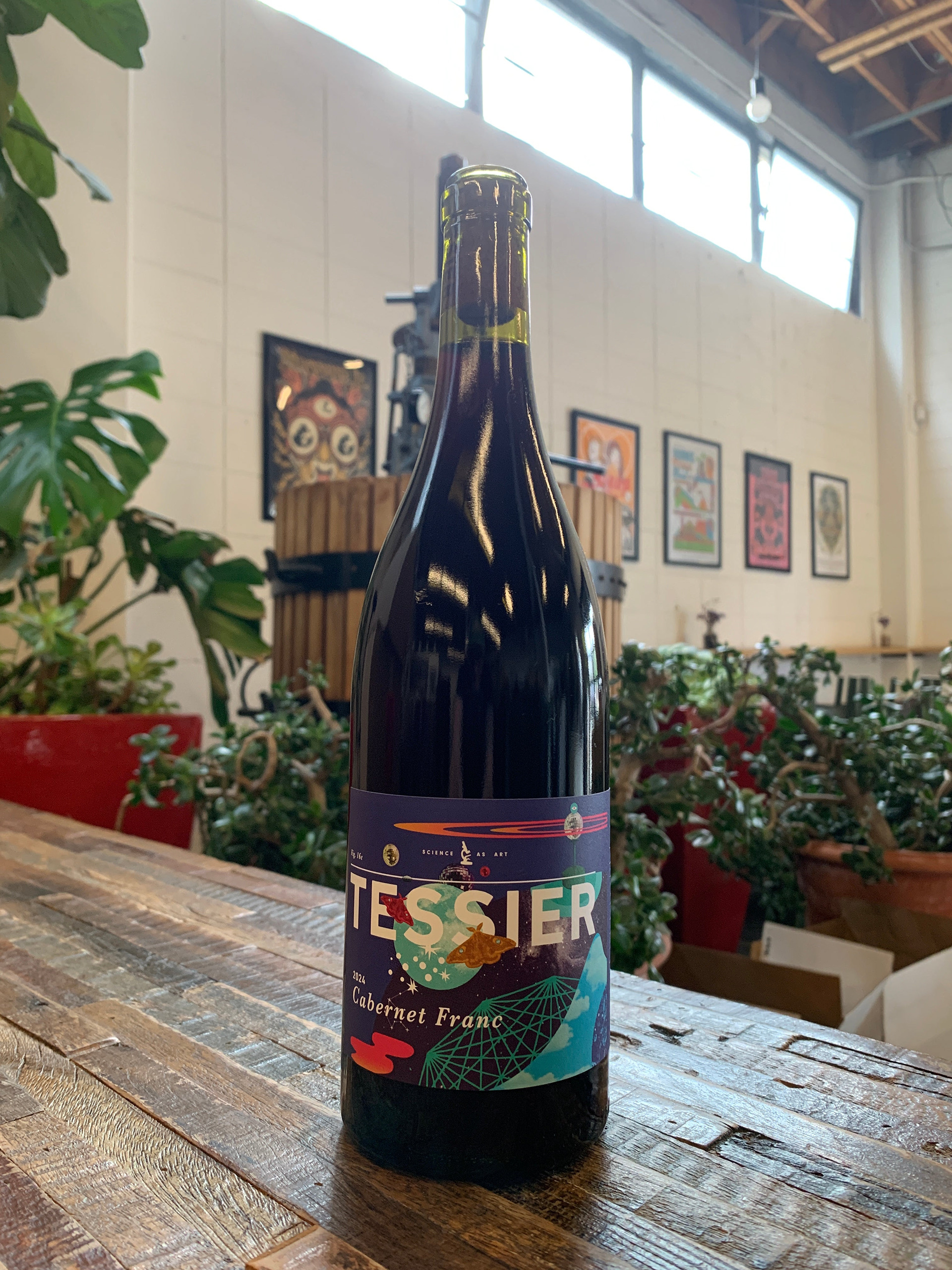 Photo of wine bottle showcasing wine label at Tessier Winery