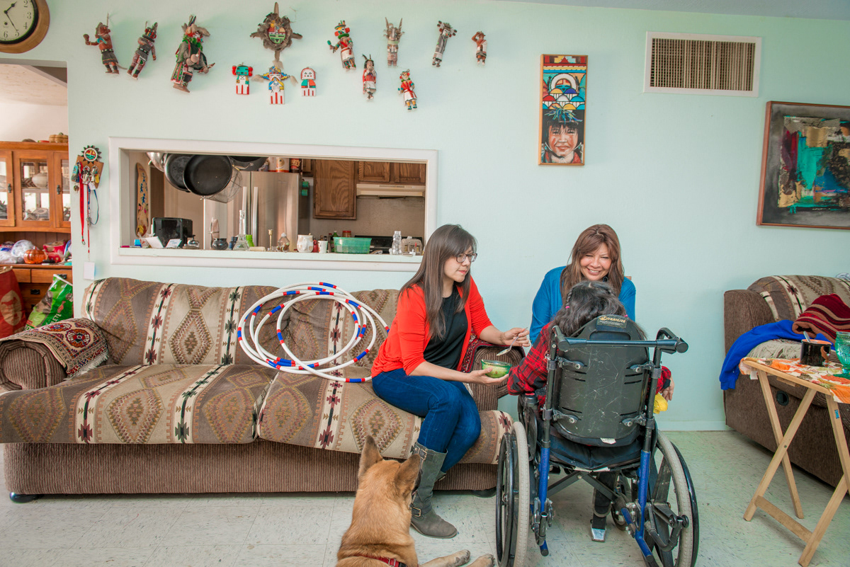 Marian with her daughter Nizhoni and sister Carol, in the wheelchair.