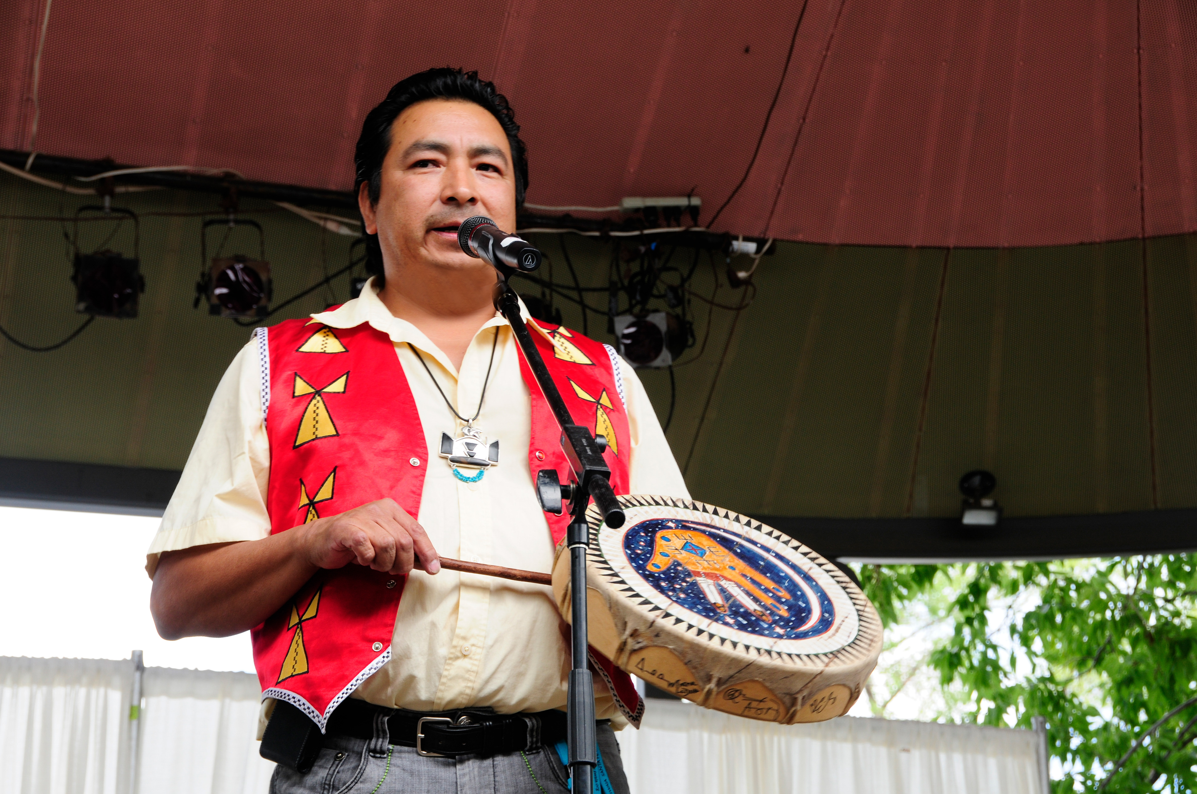 Steve beats the drum as Nakotah spins the hoops, 2009.